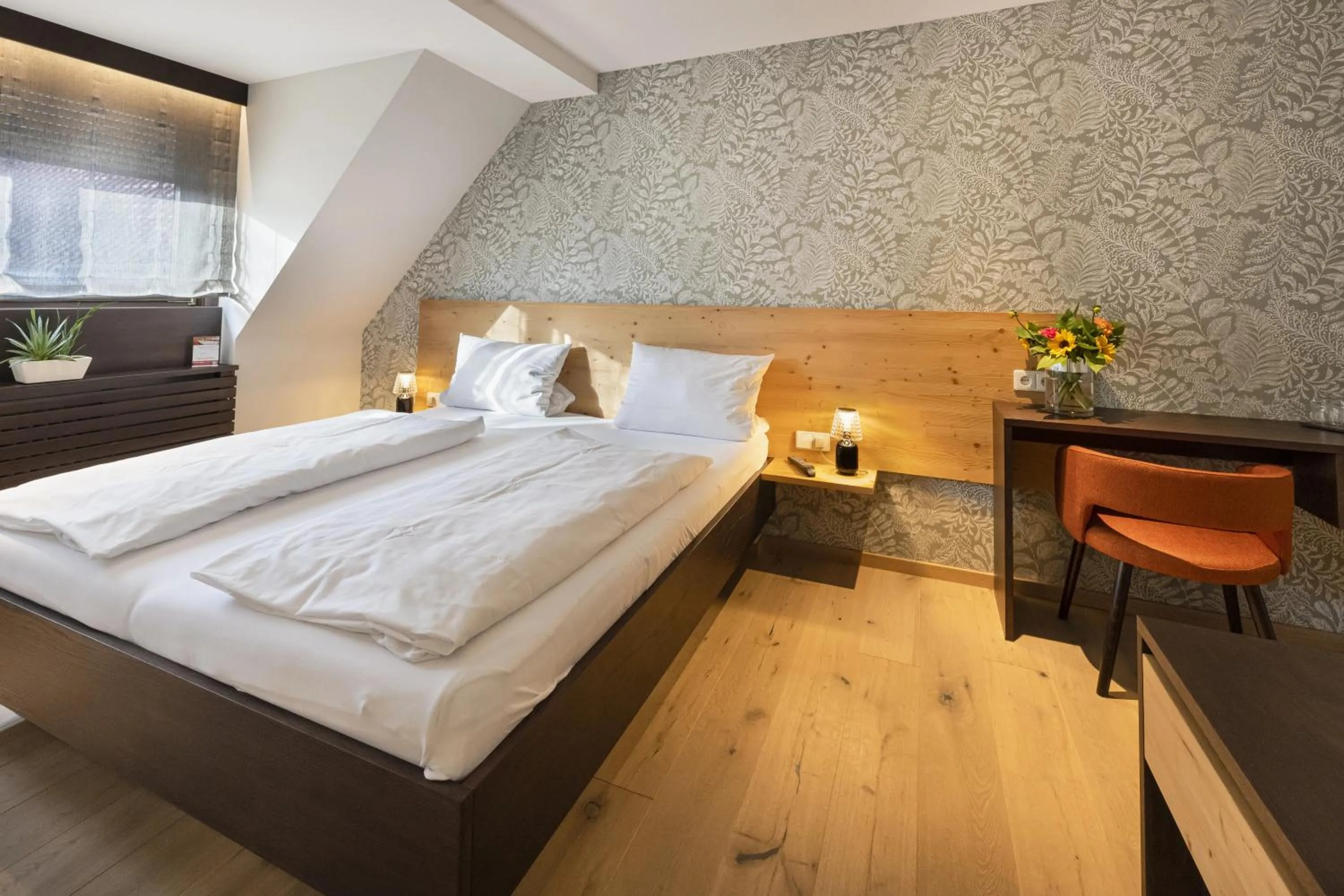 Bed in Jauch's Löwen Hotel-Restaurant