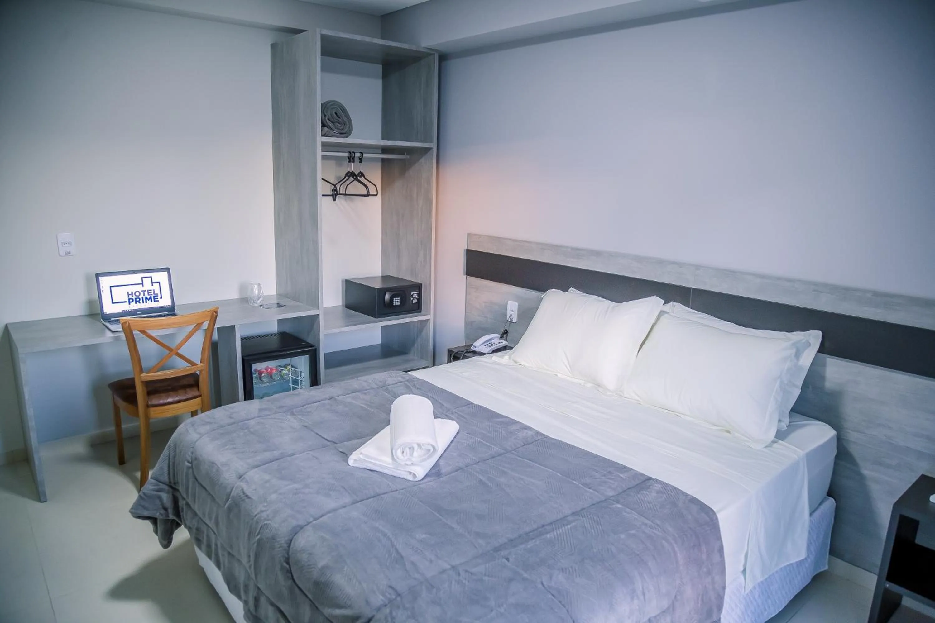 Bed in Hotel Prime Executive