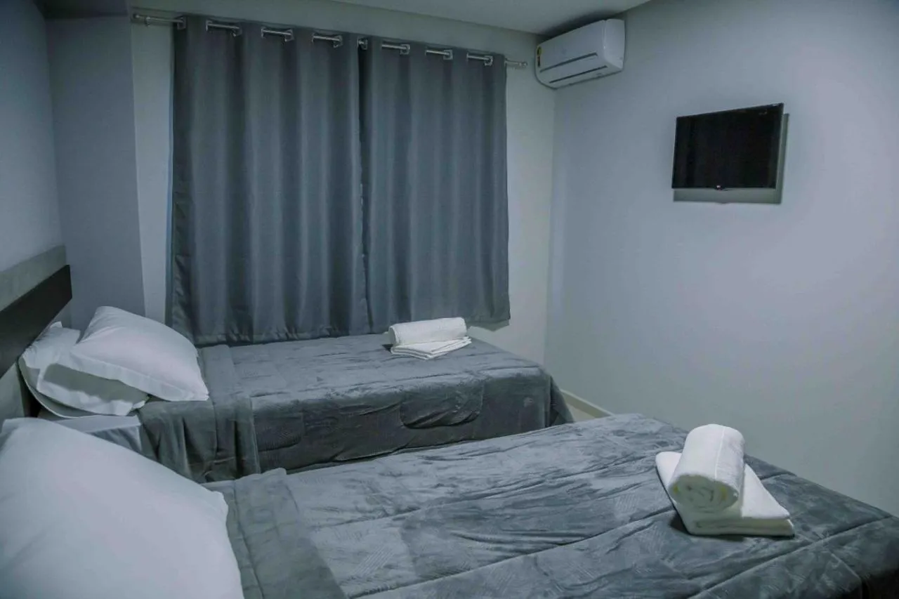 Bed in Hotel Prime Executive