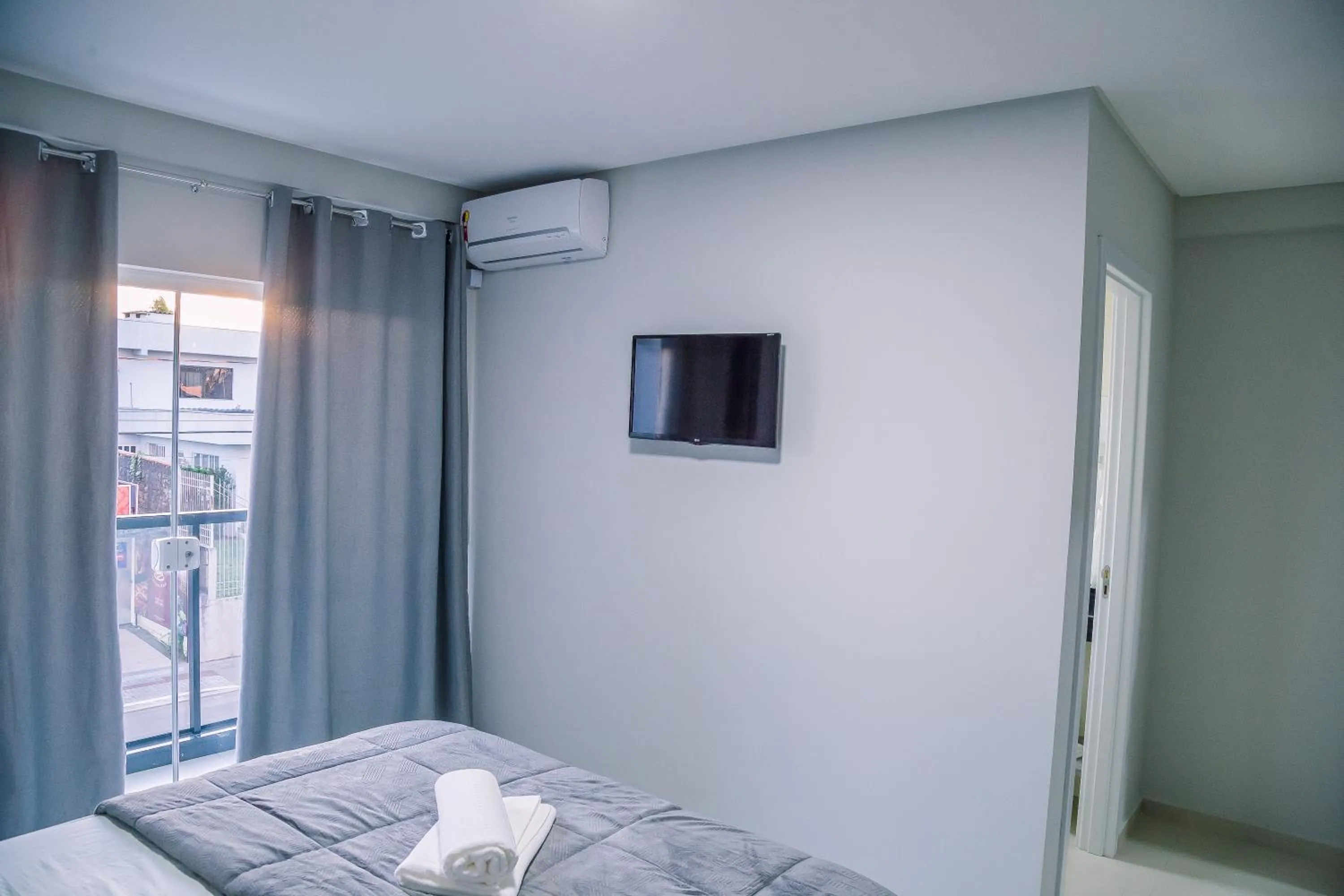 Bed in Hotel Prime Executive