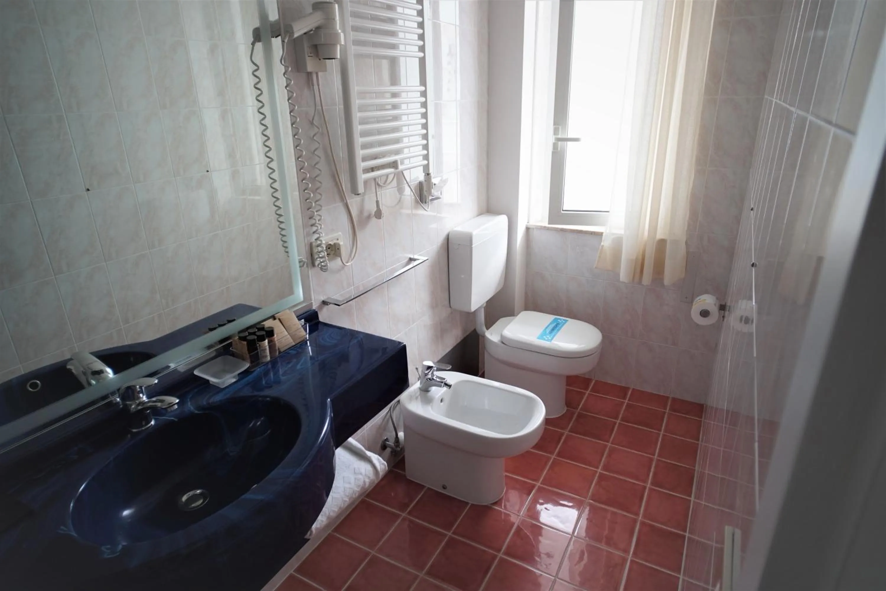 Toilet in Hotel Rossini 4S