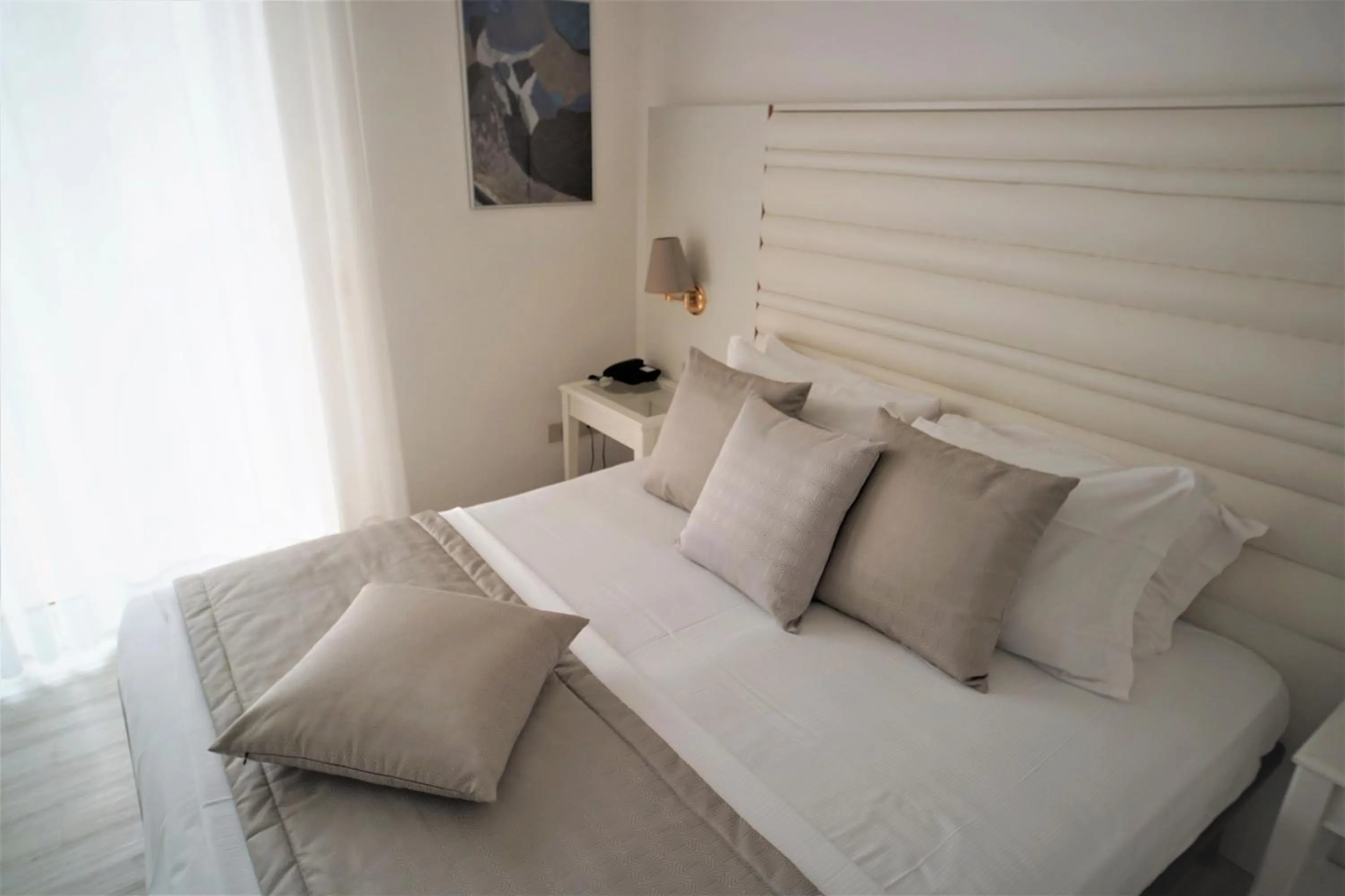 Bed in Hotel Rossini 4S