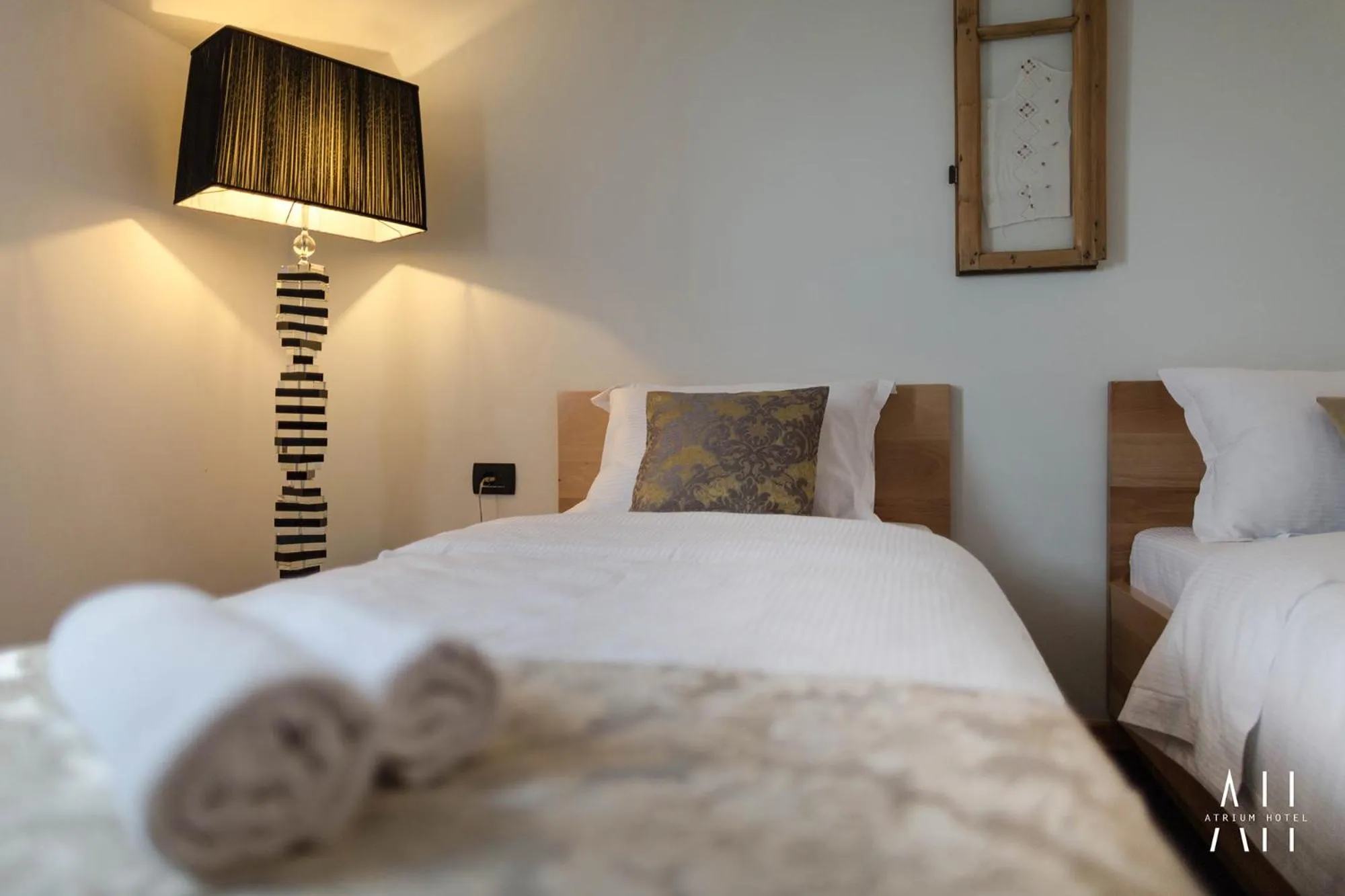 Bed in GARNI HOTEL ATRIUM