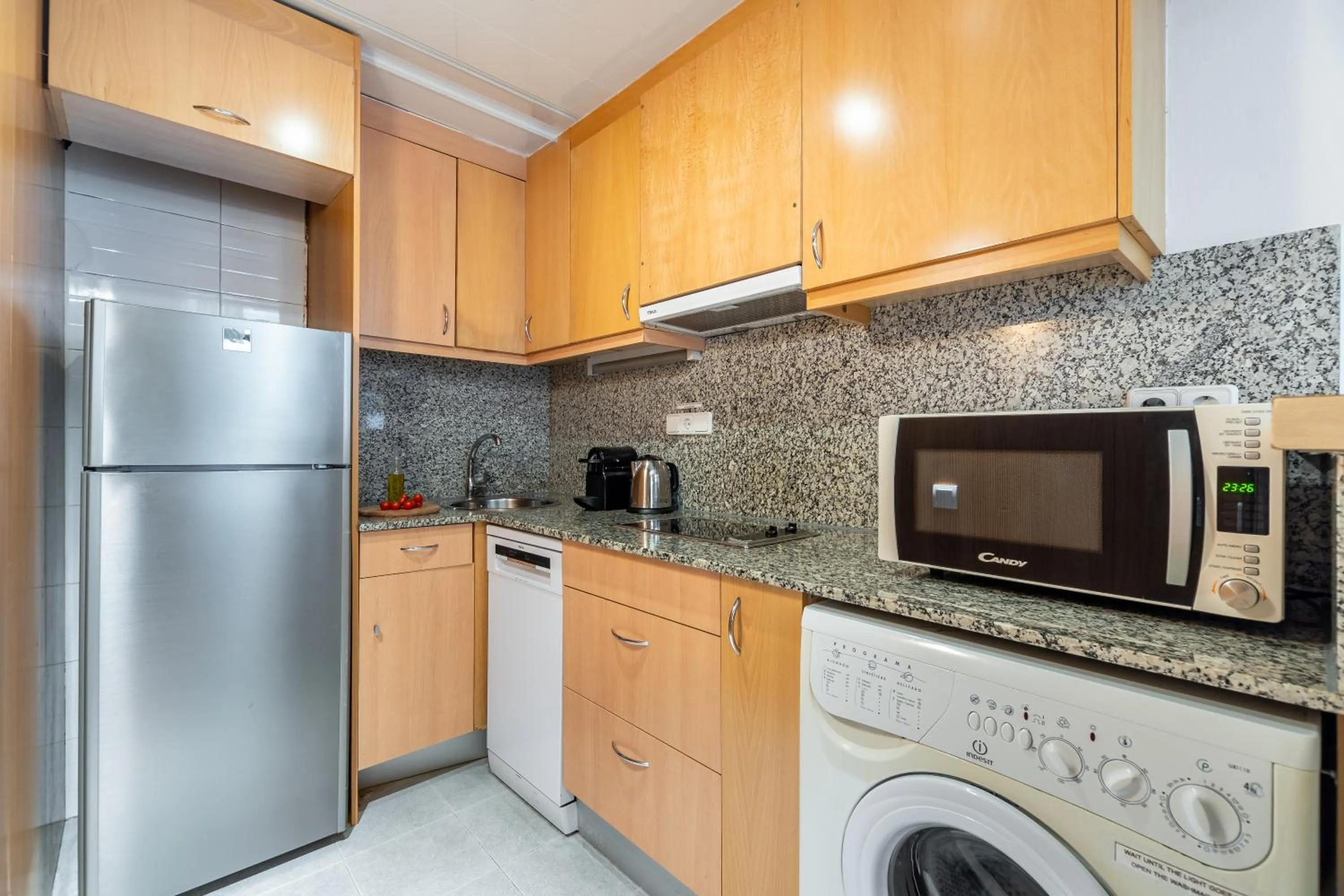 Kitchen or kitchenette in Aspasios Plaza Real Apartments