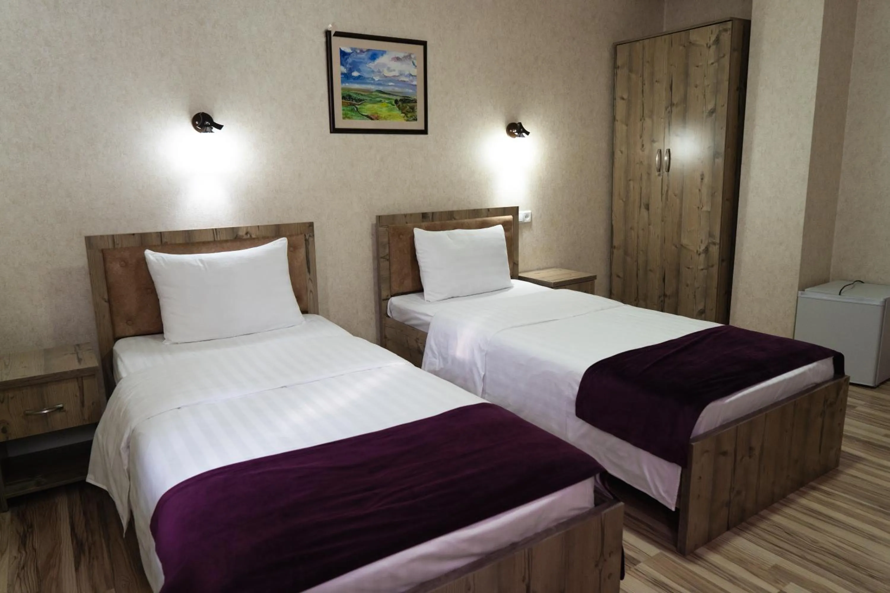 Bed in TOURIST INN hotel