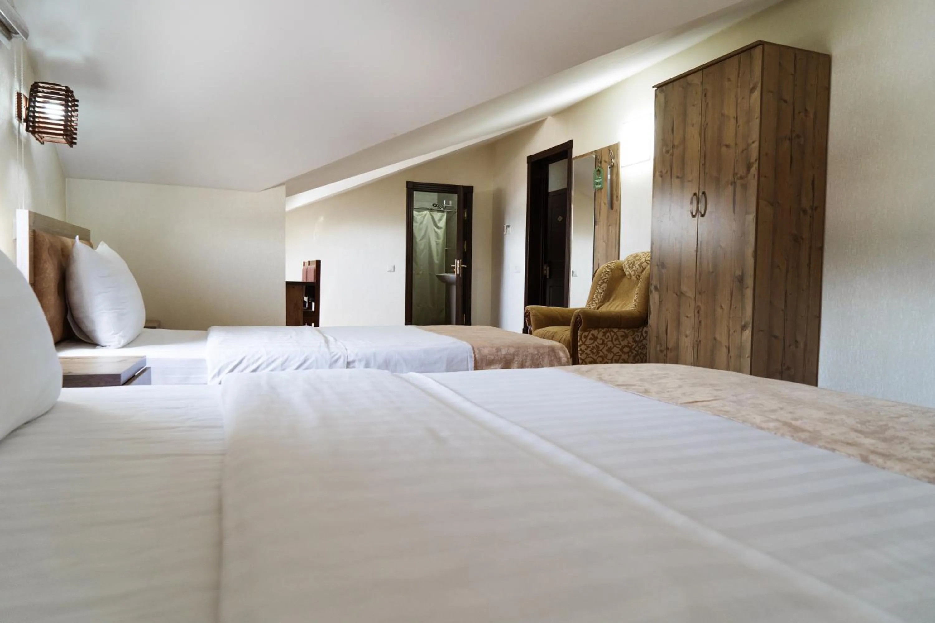 Bed in TOURIST INN hotel