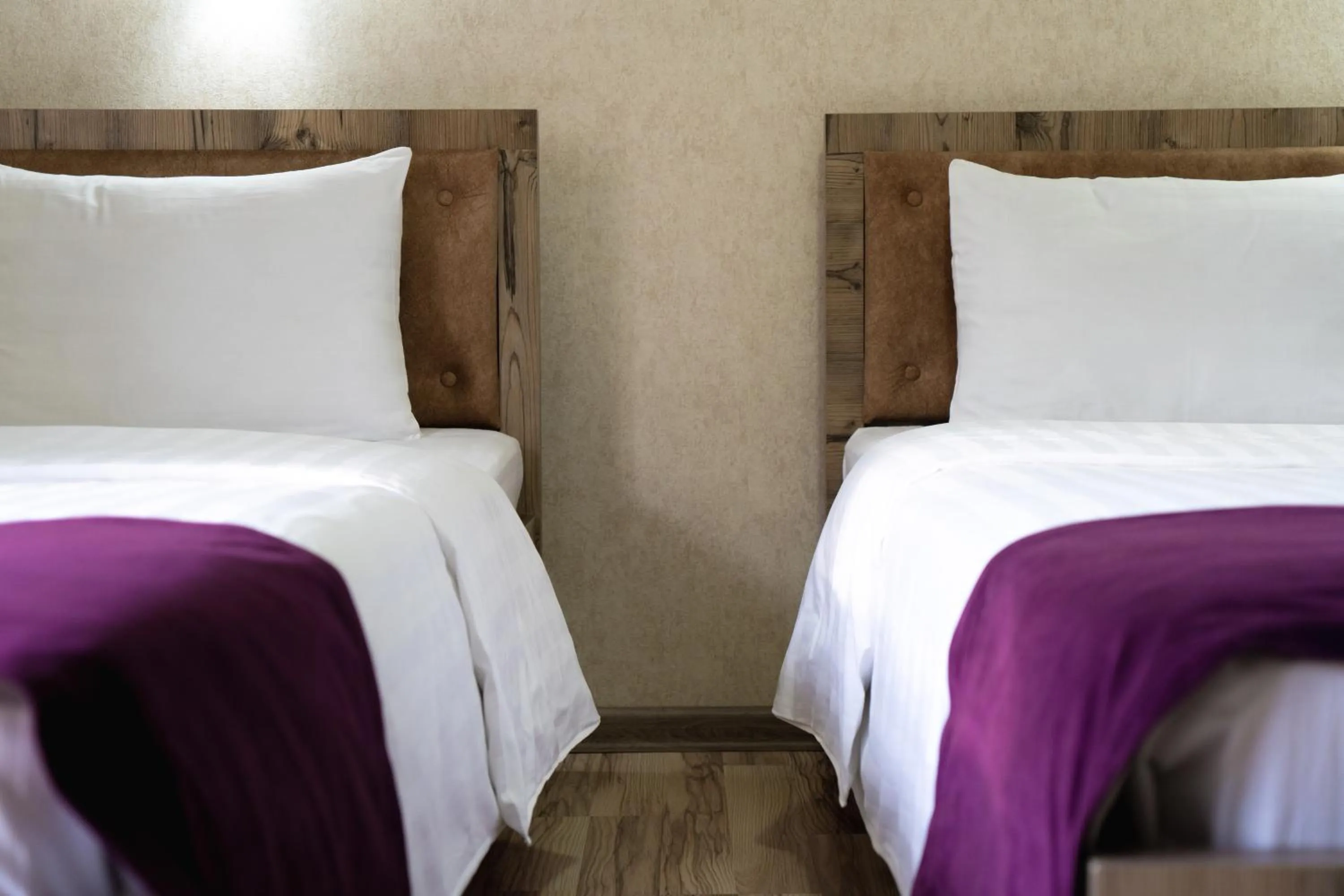 Bed in TOURIST INN hotel