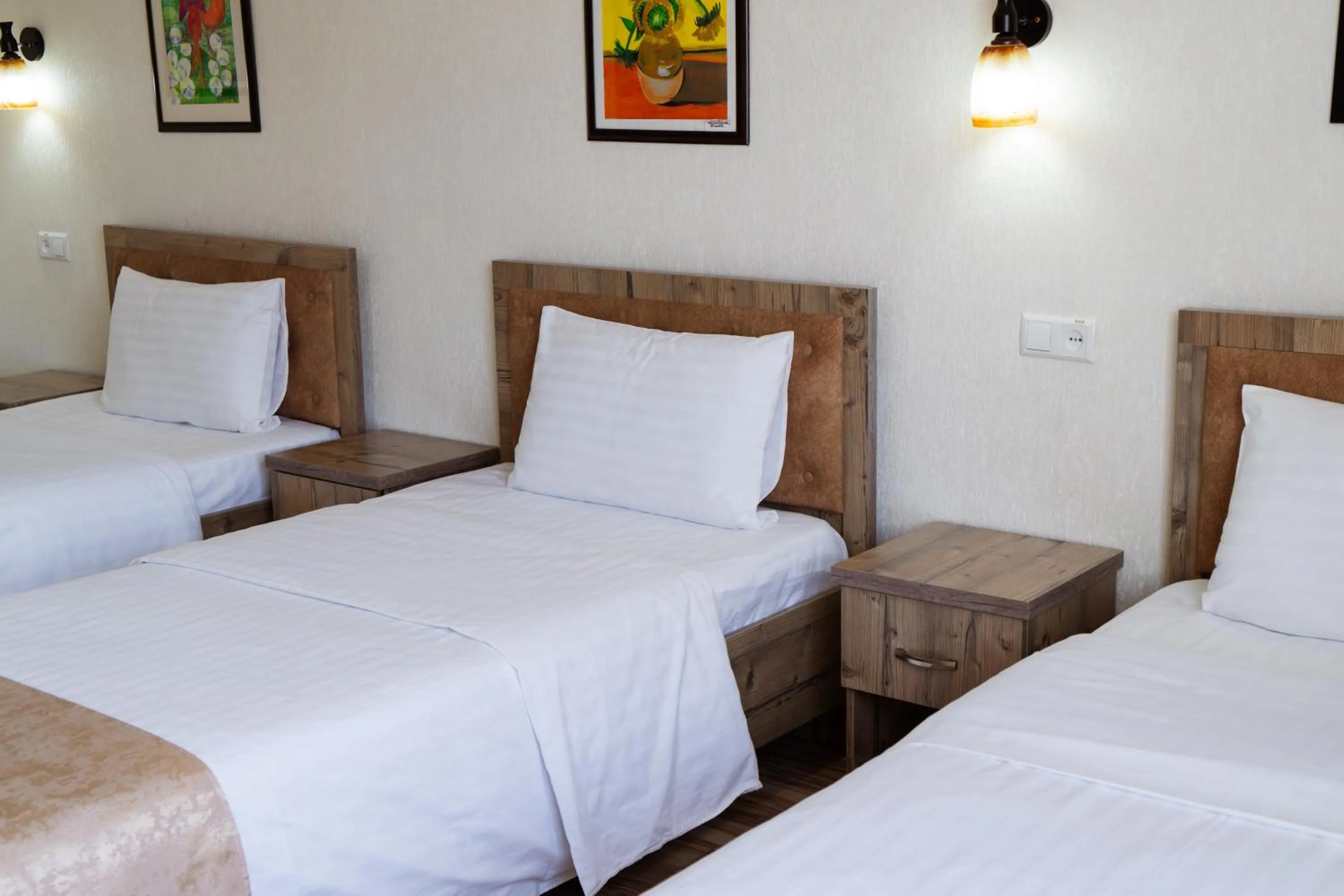 Bed in TOURIST INN hotel