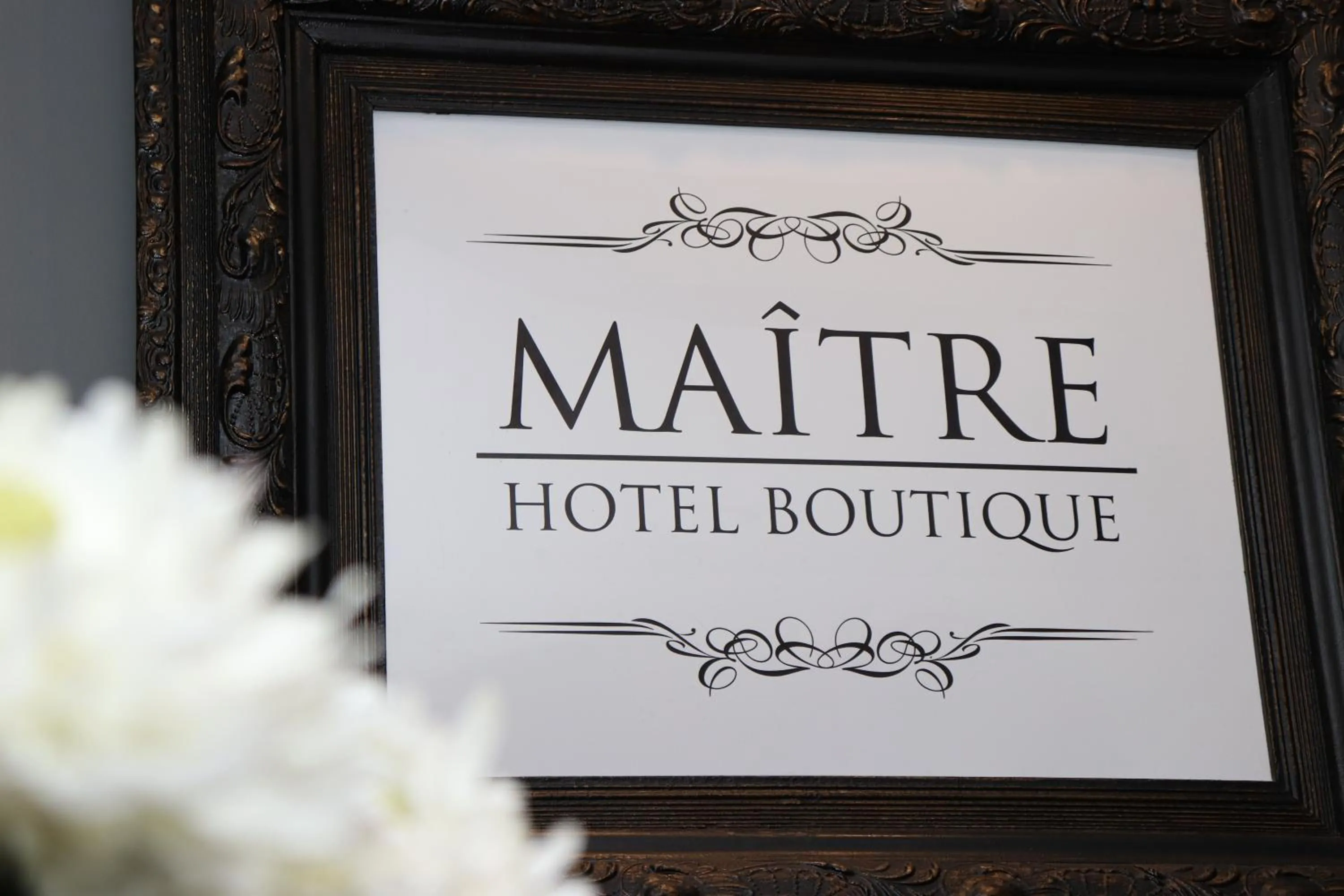 Property logo or sign in Maitre Hotel Boutique
