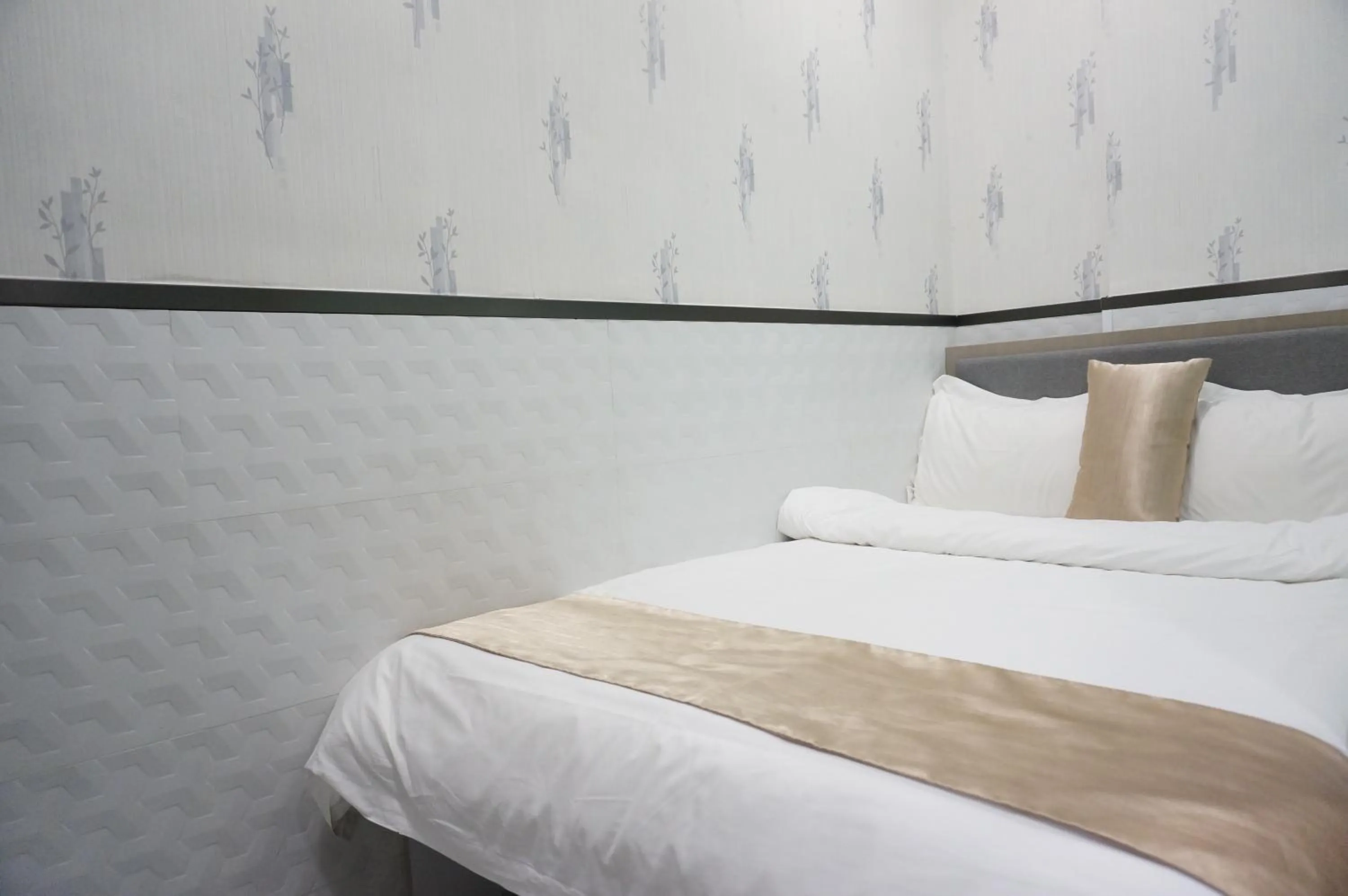 Bed in Vve Vve Hotel