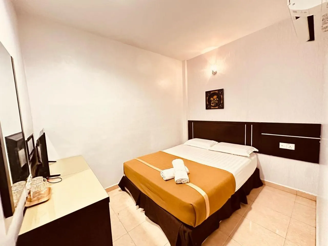 Bed in Rainbow Hotel