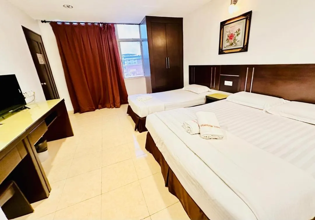 Bed in Rainbow Hotel