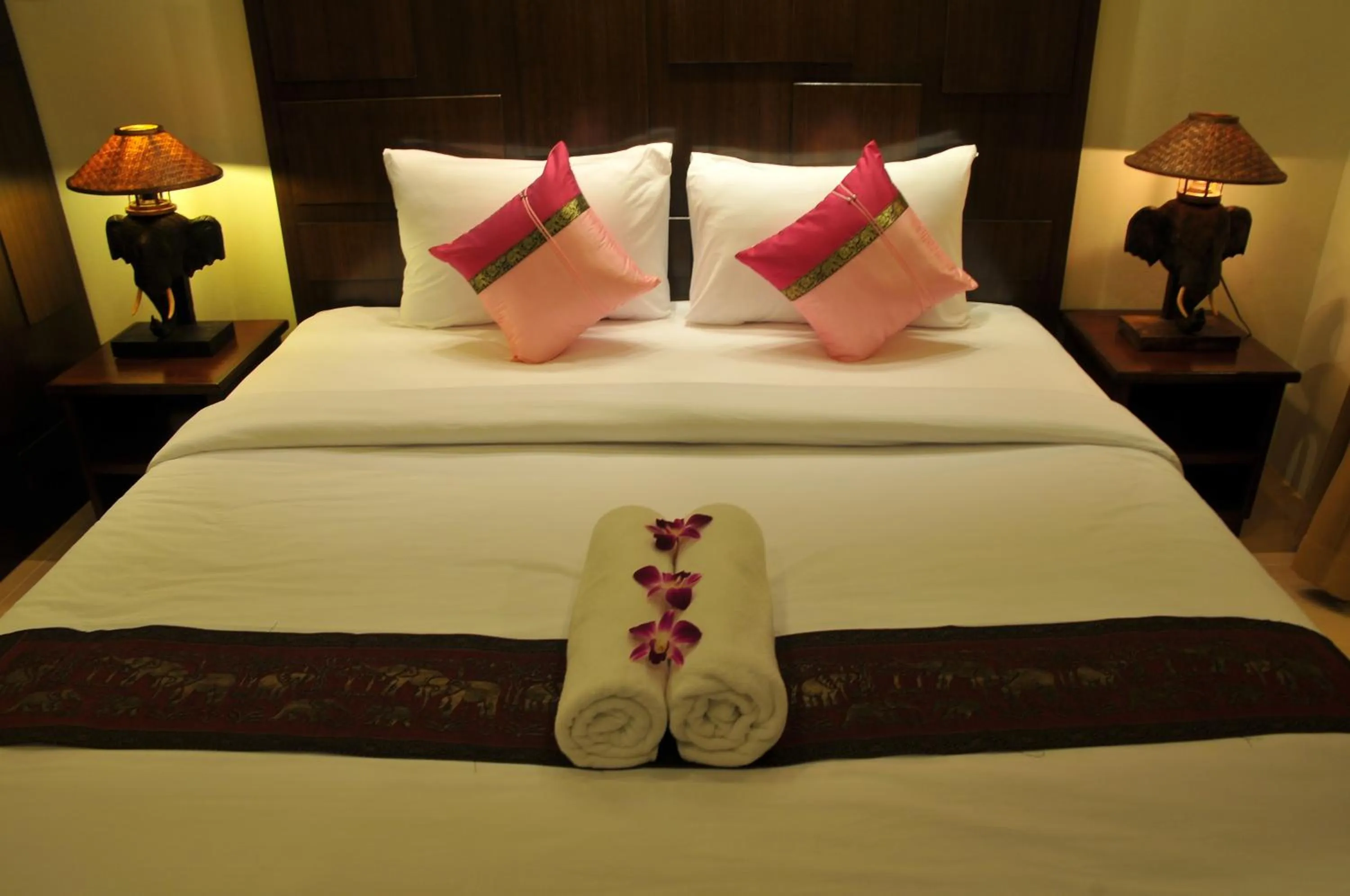 Bed in Boonjumnong Modern Apartment