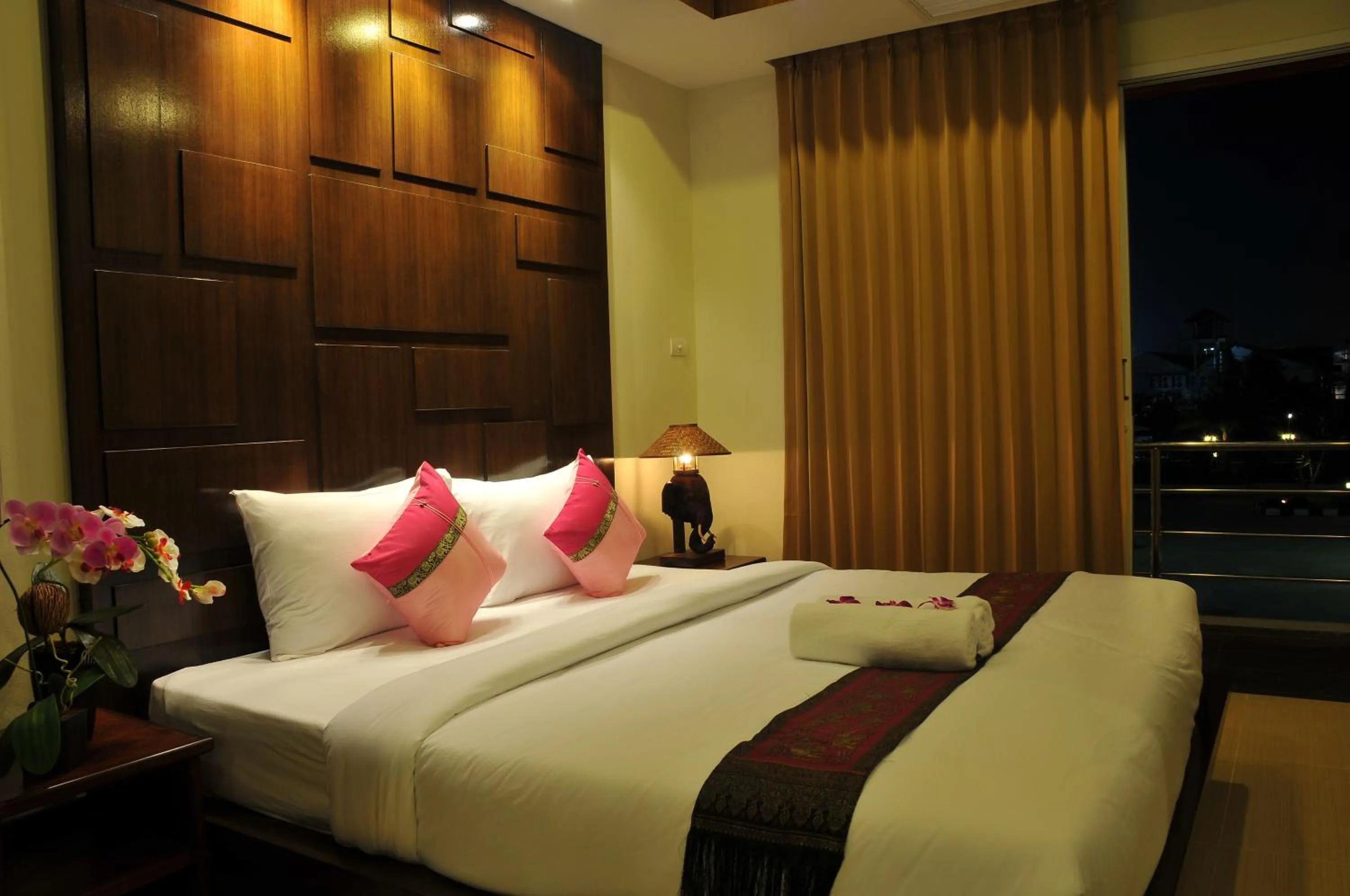 Bed in Boonjumnong Modern Apartment