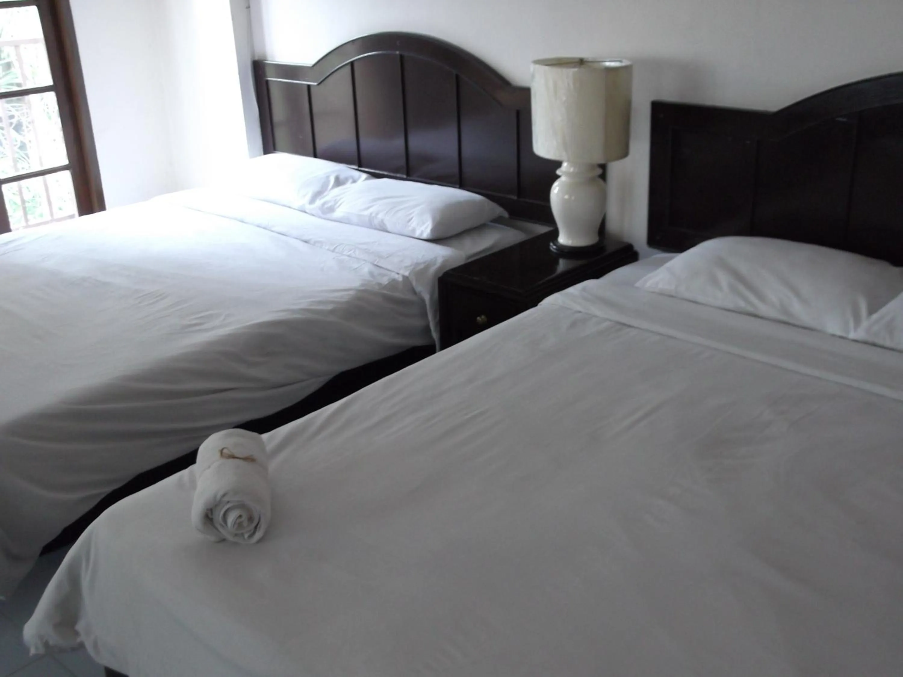 Bed in Rim Ping Guest House