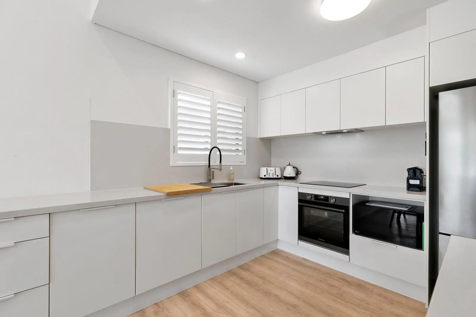 Kitchen or kitchenette in The Noosa Apartments