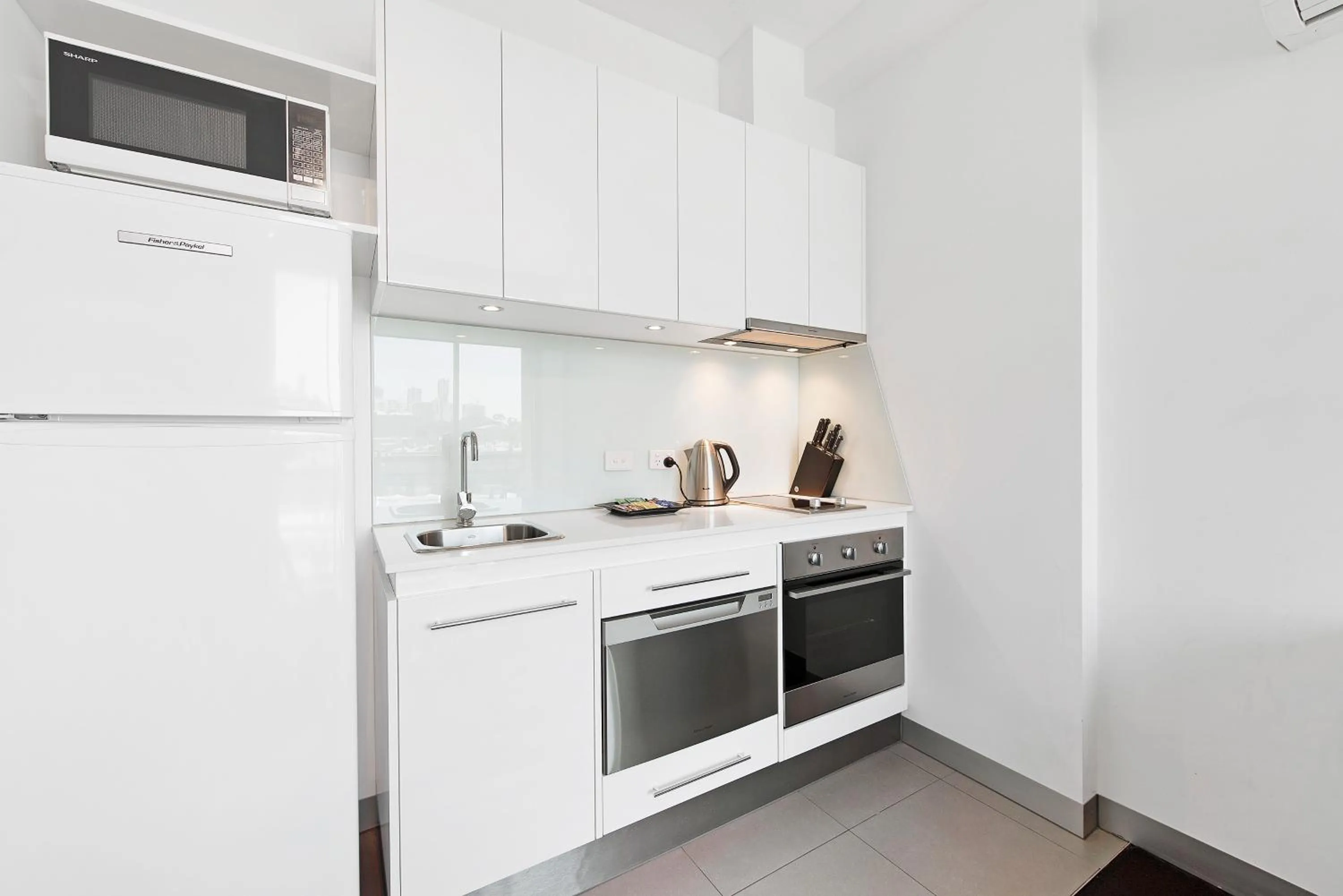 Kitchen or kitchenette in Docklands Private Collection - City Harbour Apartments