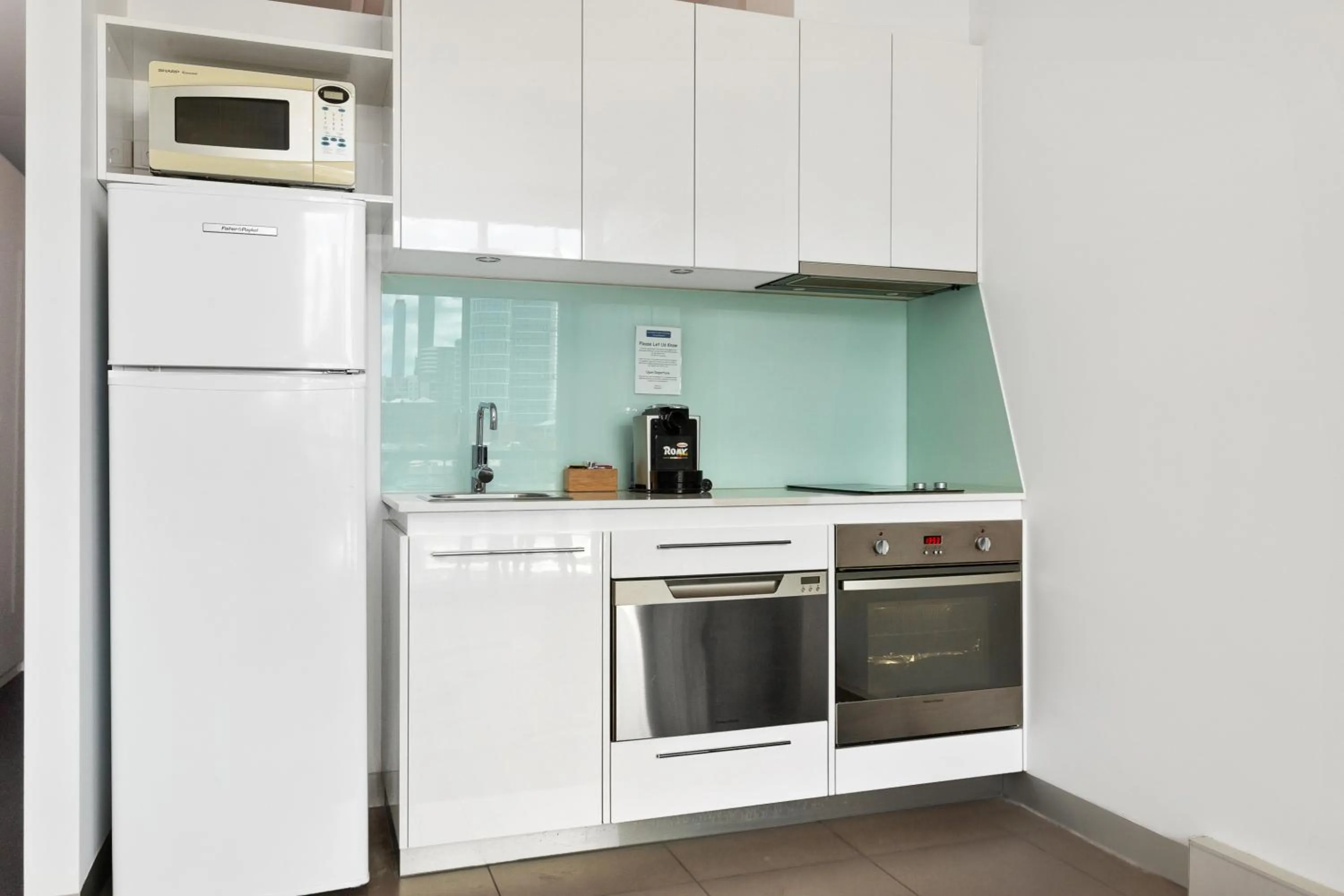 Kitchen or kitchenette in Docklands Private Collection - City Harbour Apartments