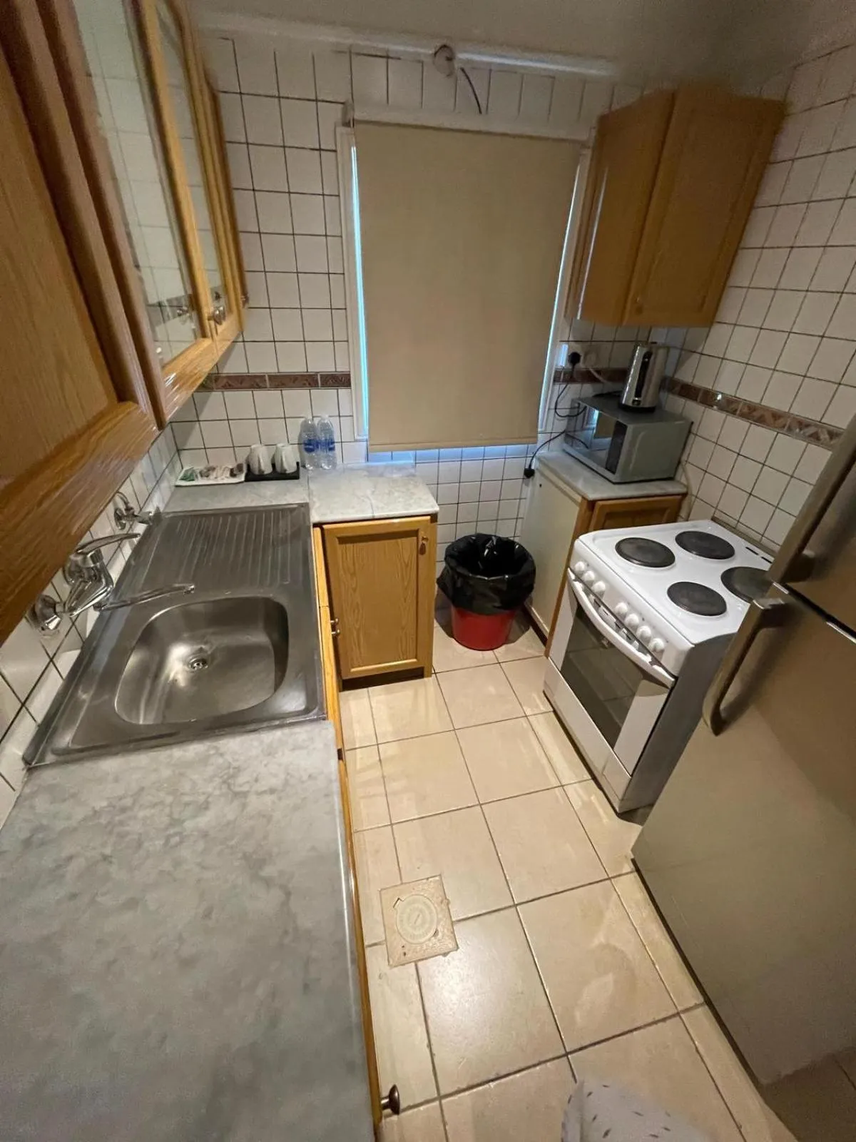 Kitchen or kitchenette in Terrace Furnished Apartments- Fintas1