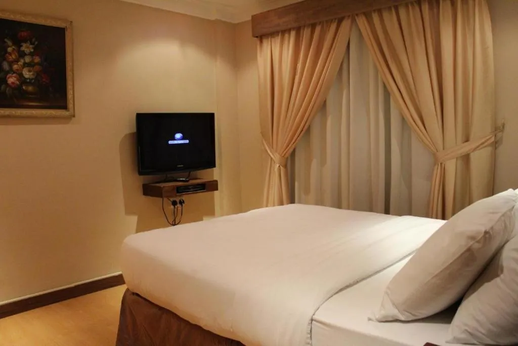 Bed in Terrace Furnished Apartments- Fintas1