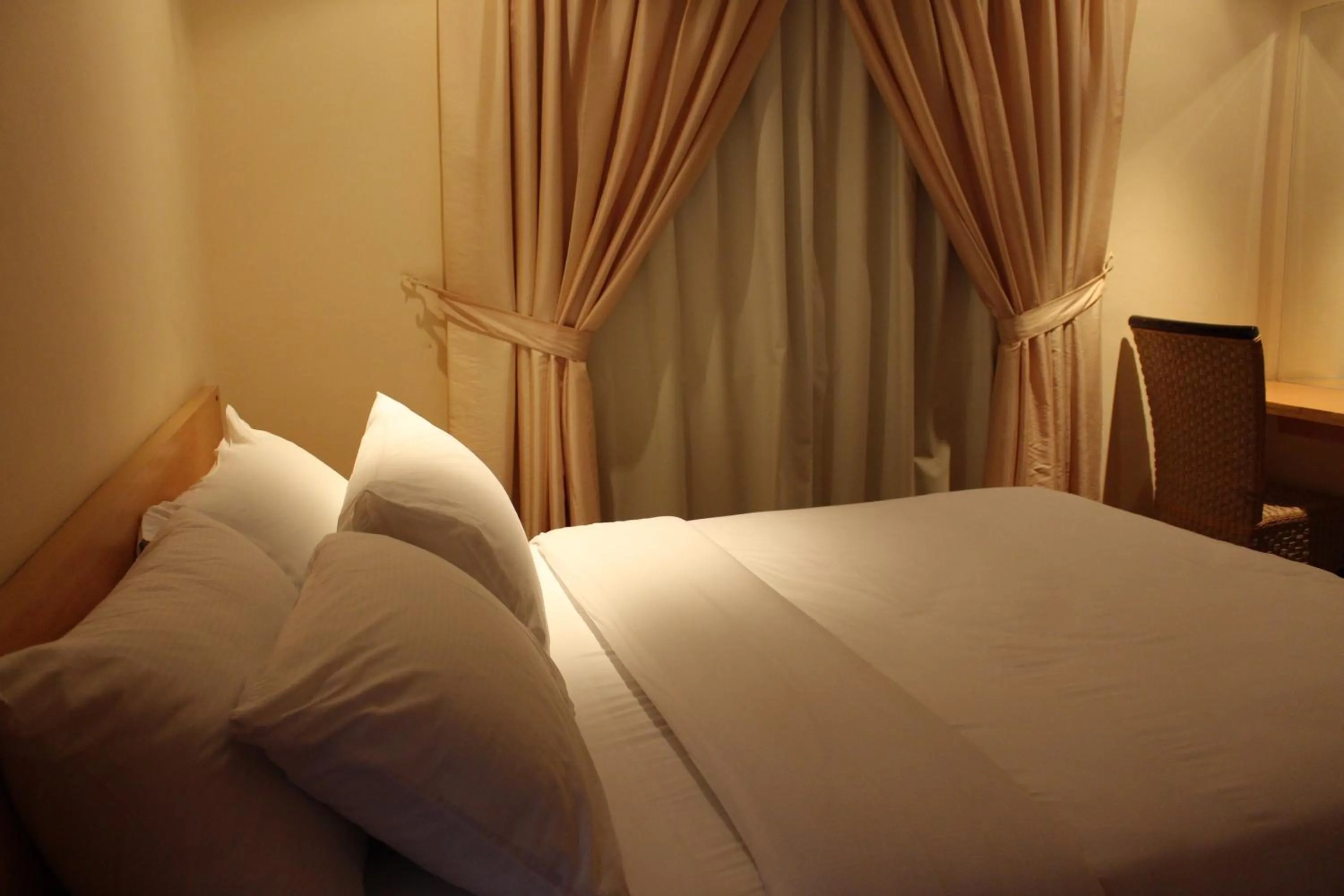Bed in Terrace Furnished Apartments- Fintas1