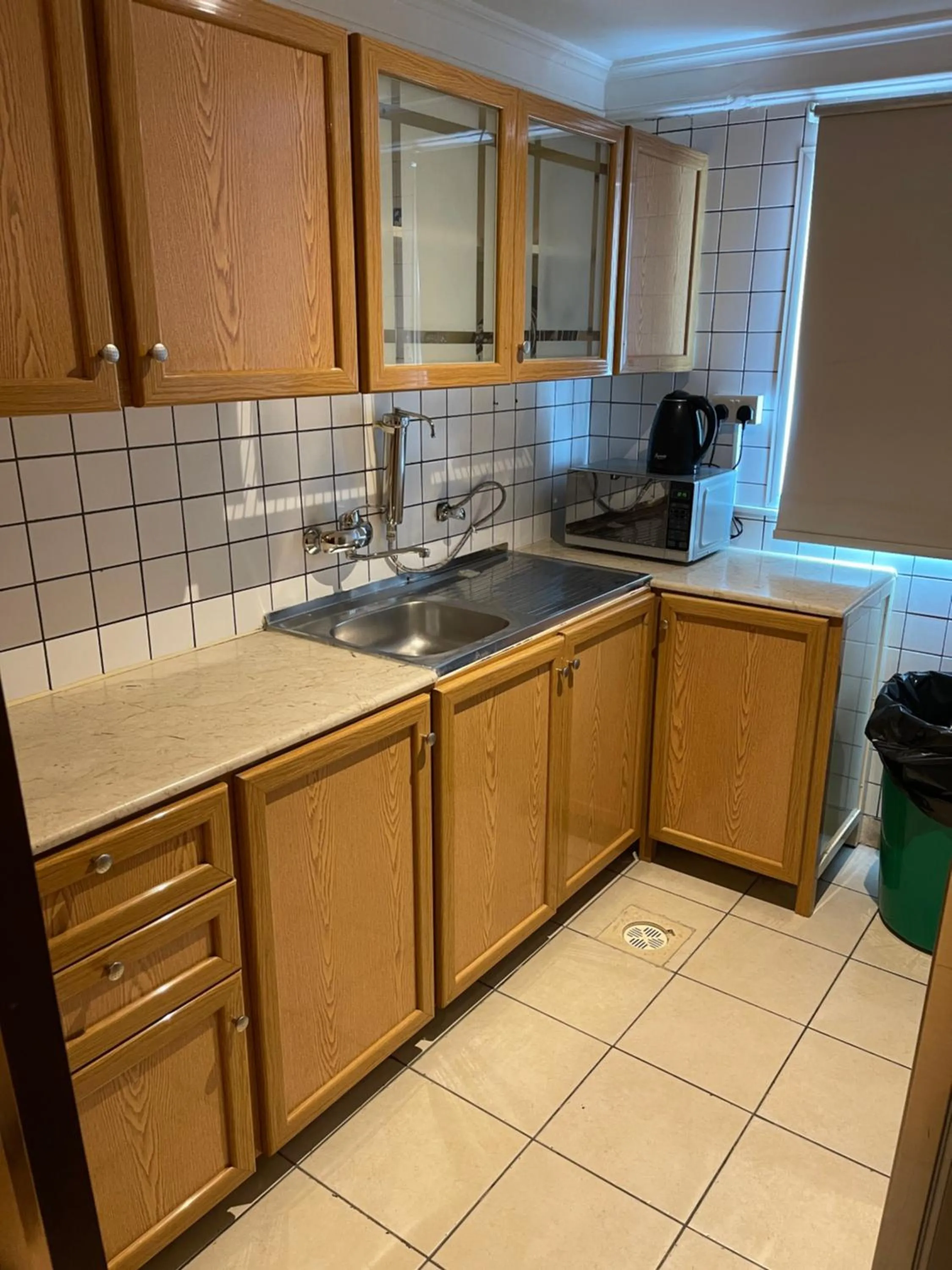 Kitchen or kitchenette in Terrace Furnished Apartments- Fintas1