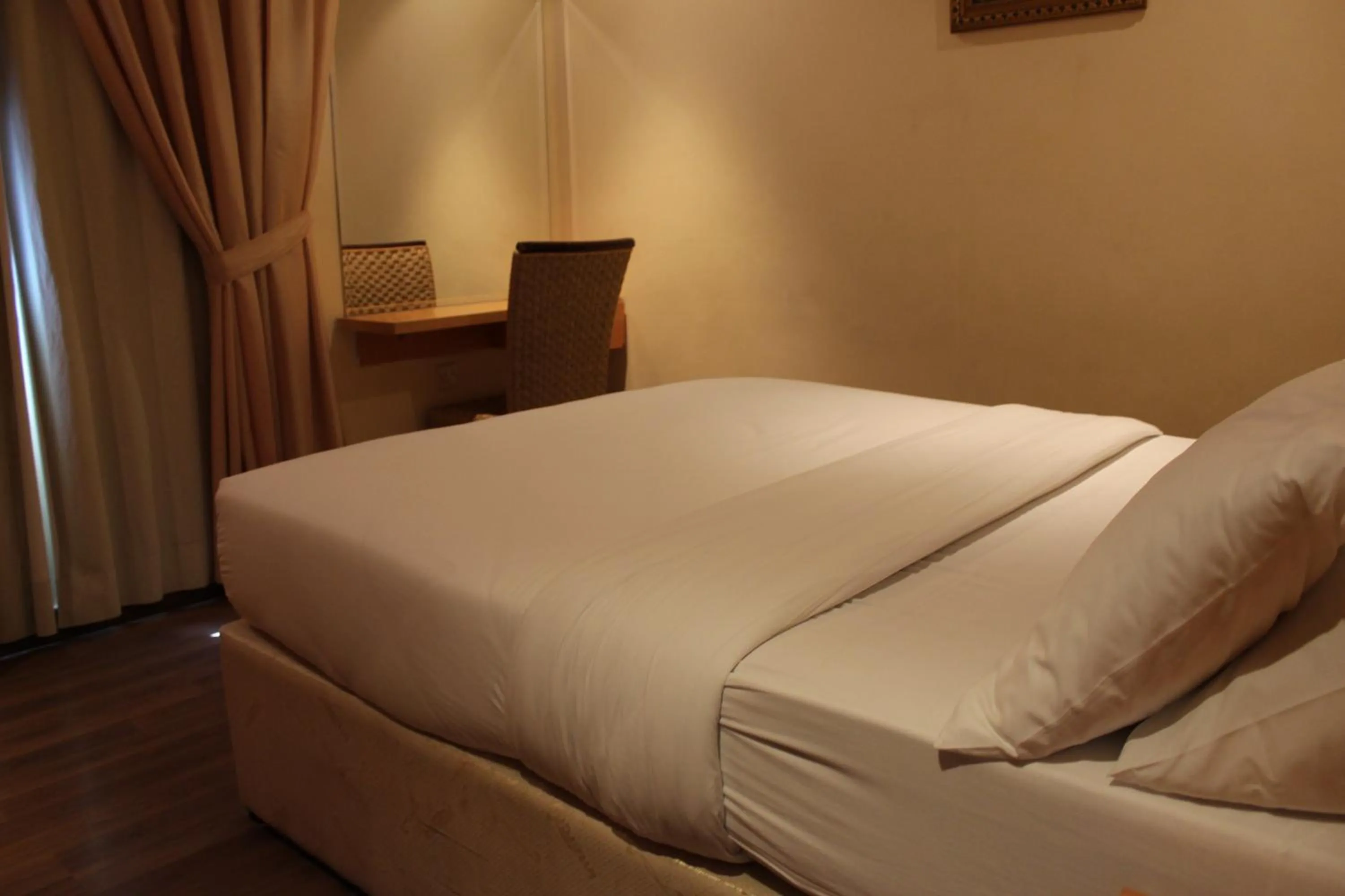 Bed in Terrace Furnished Apartments- Fintas1