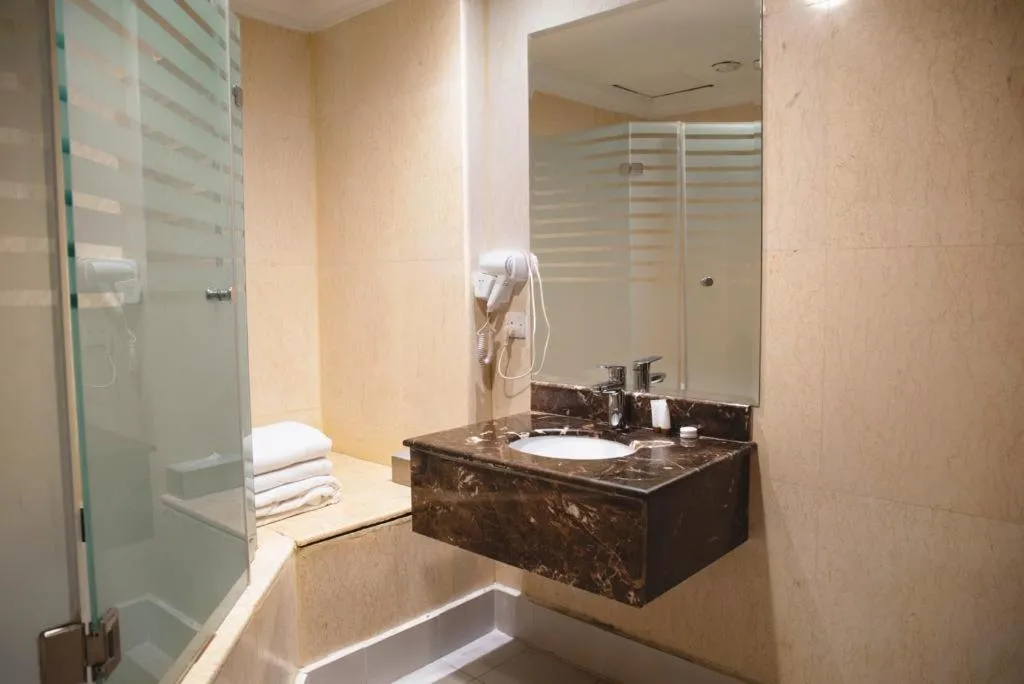 Bathroom in Terrace Furnished Apartments- Fintas1