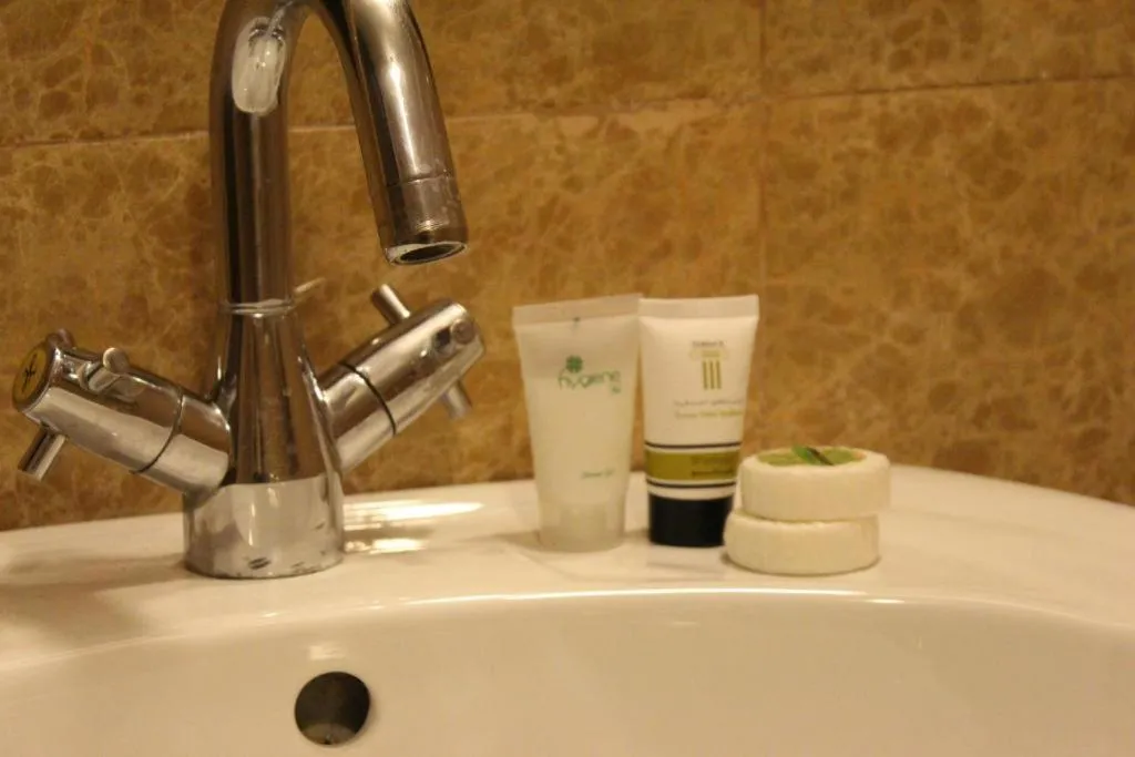 Bathroom in Terrace Furnished Apartments- Fintas1