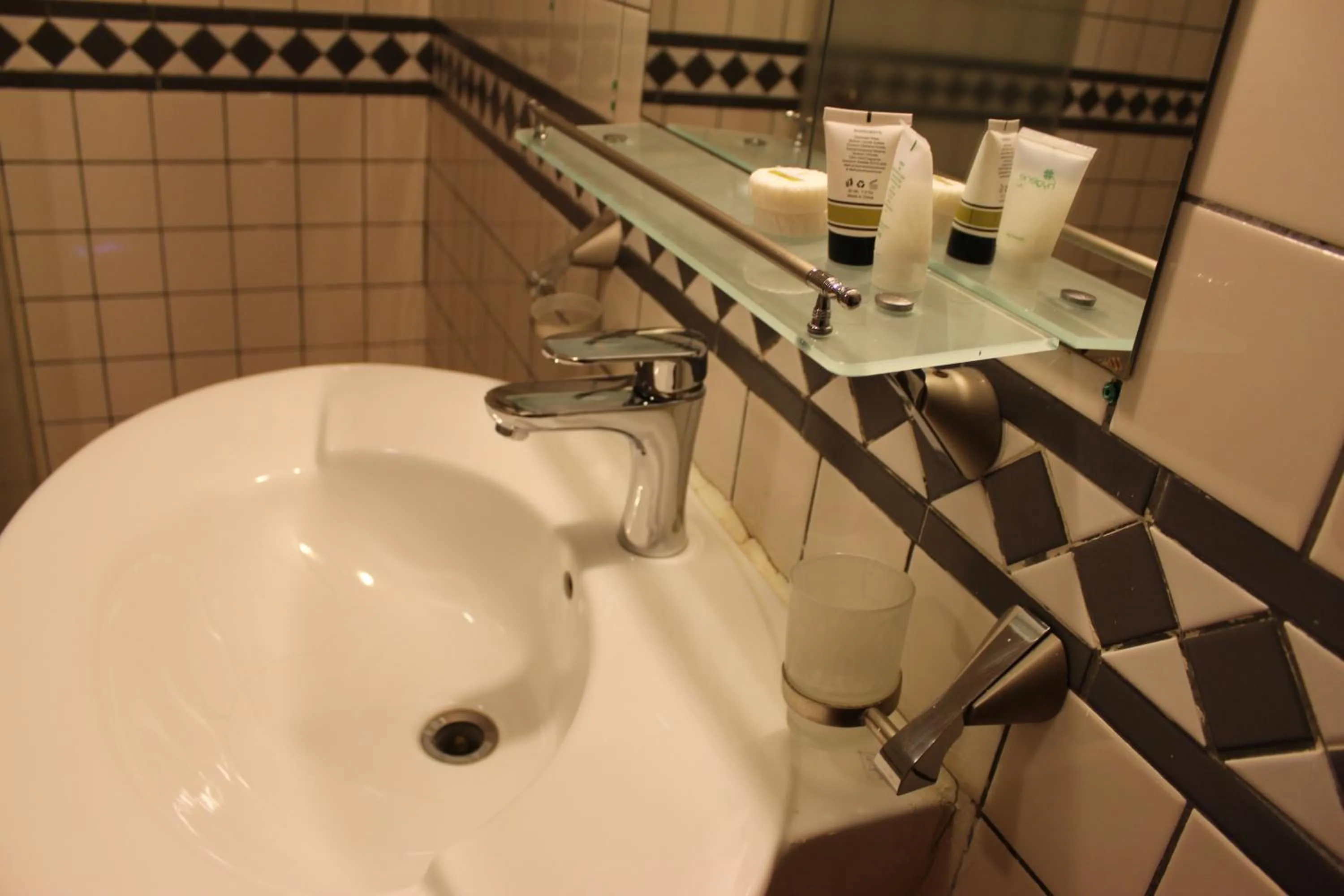 Bathroom in Terrace Furnished Apartments- Fintas1