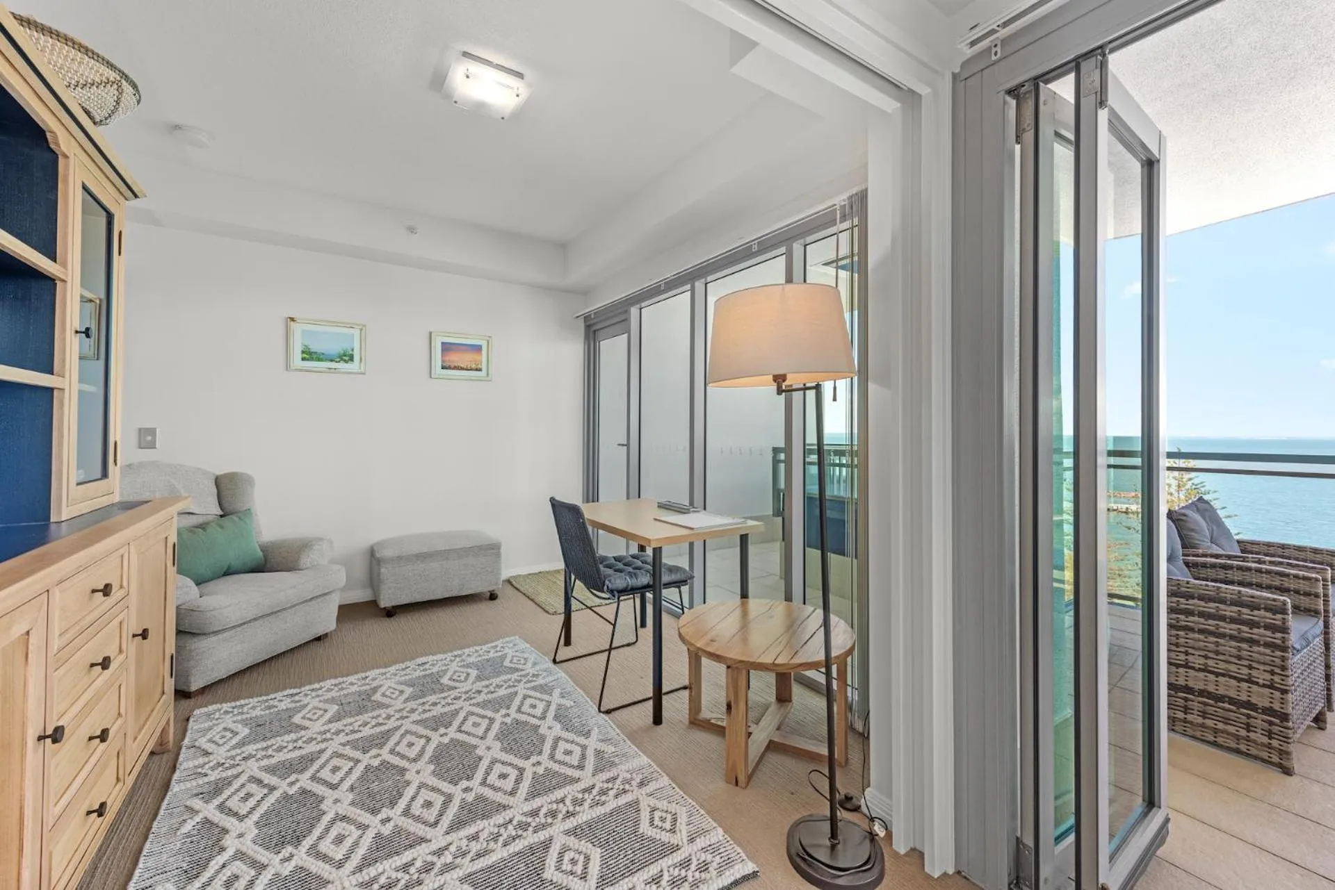 Seating area, Bed in Proximity Waterfront Apartments