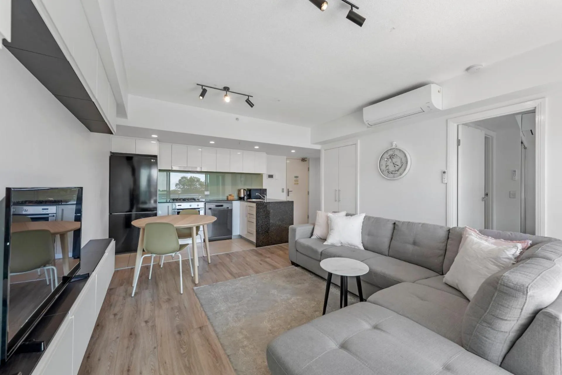 Living room in Proximity Waterfront Apartments