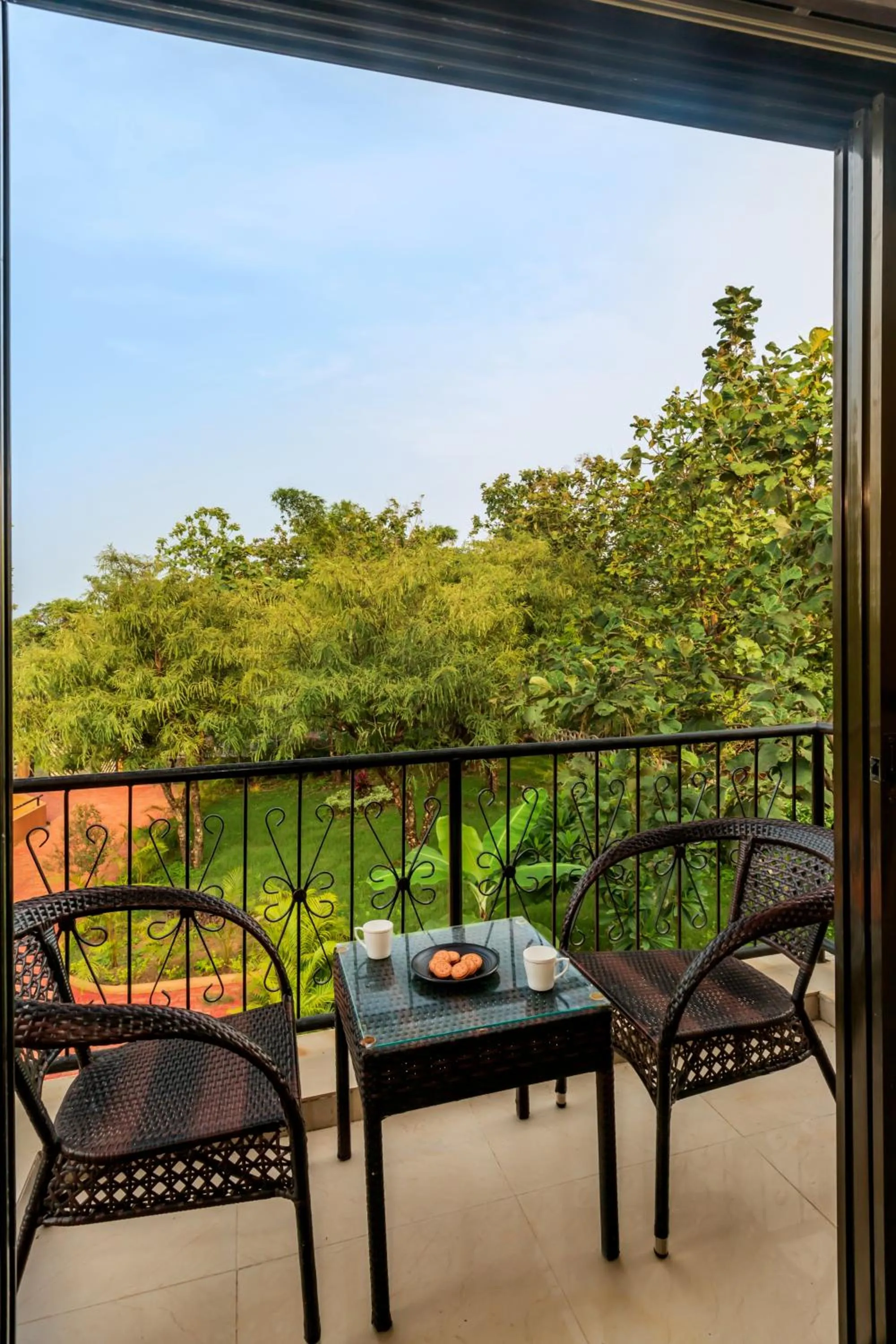 Day in SaffronStays Ekaant- 3BR pet-friendly pool villa with lawn, games & river walk in gated community near Mumbai