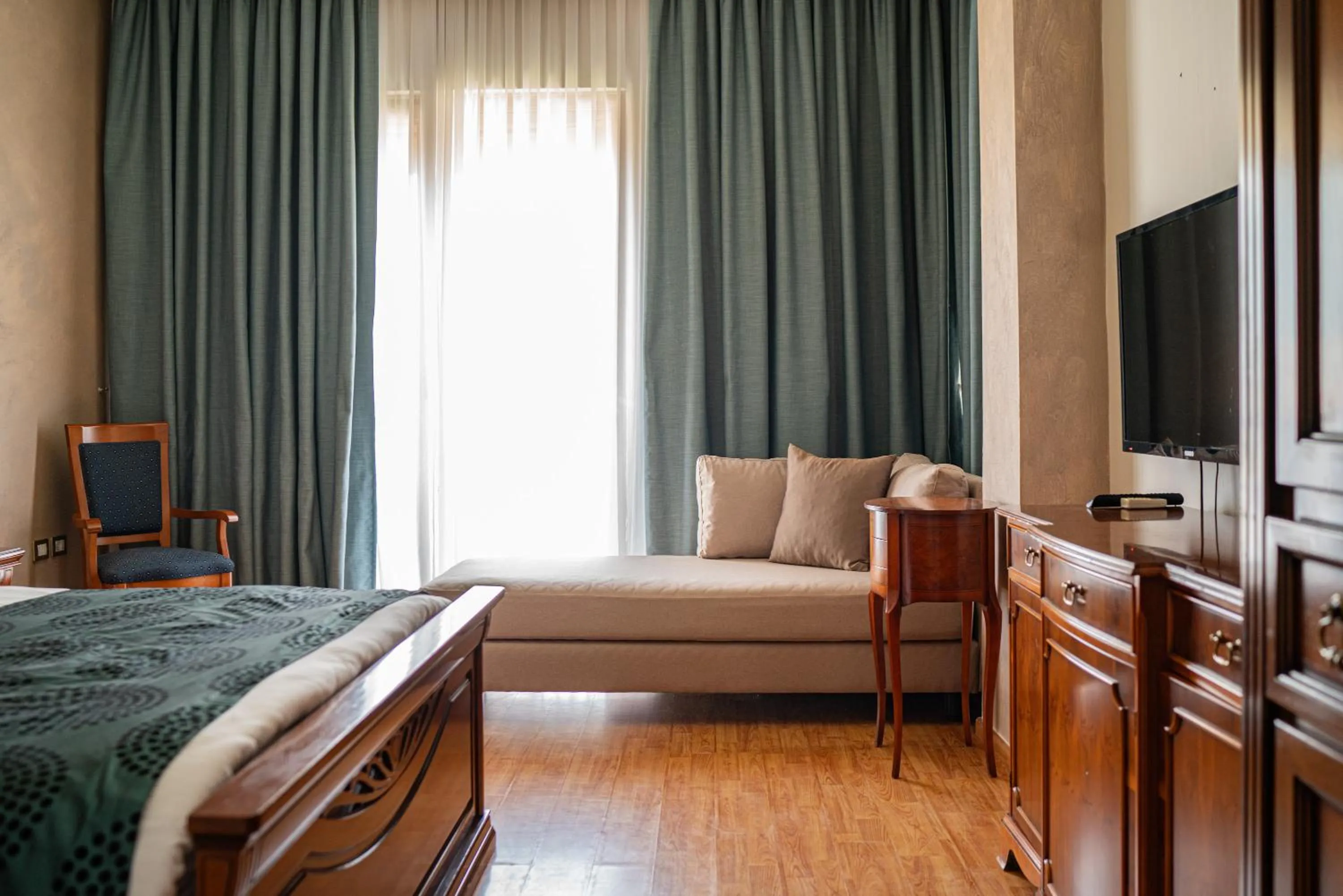 Communal lounge/ TV room in Vila Belvedere