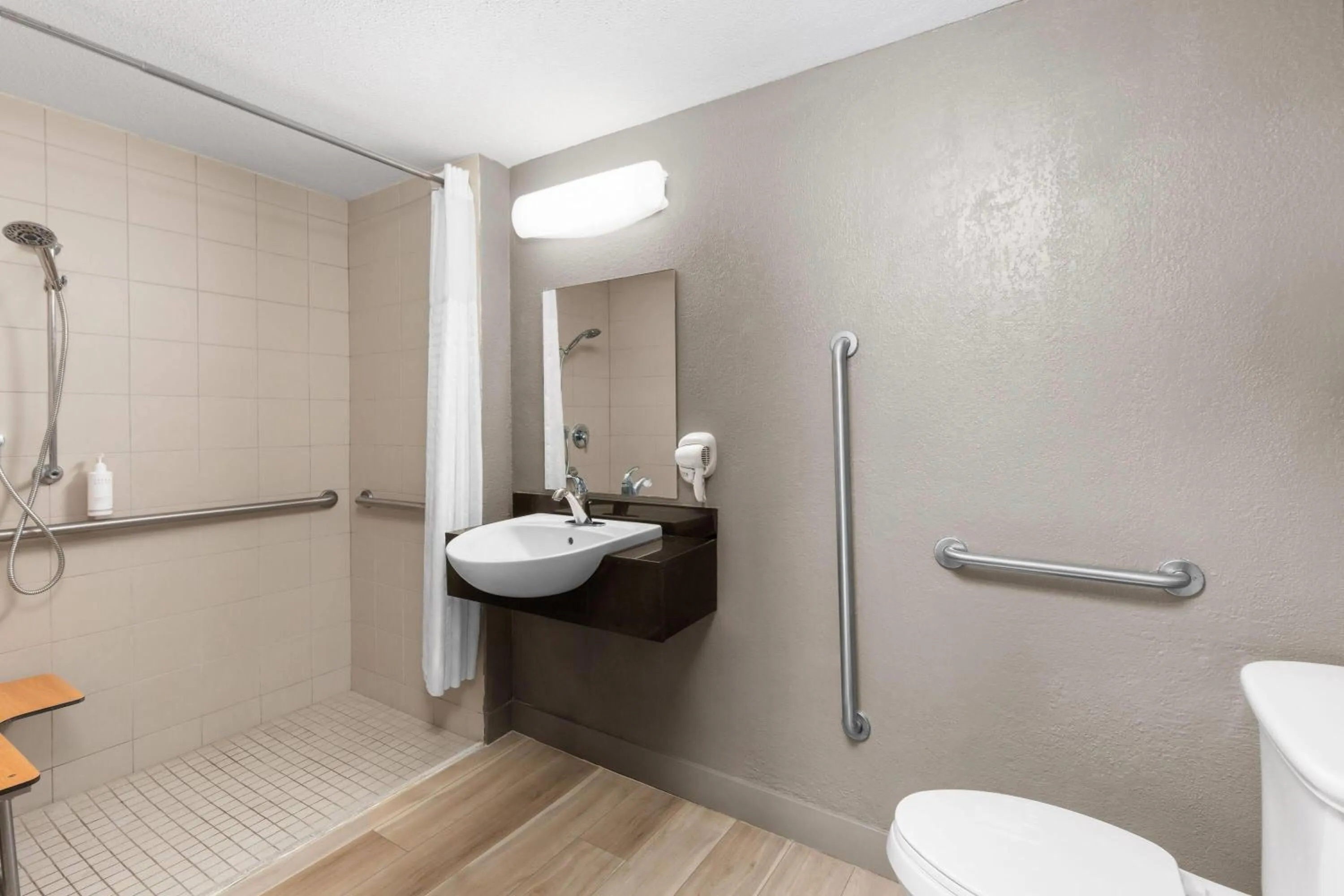 Bathroom in Days Inn by Wyndham Charleston WV