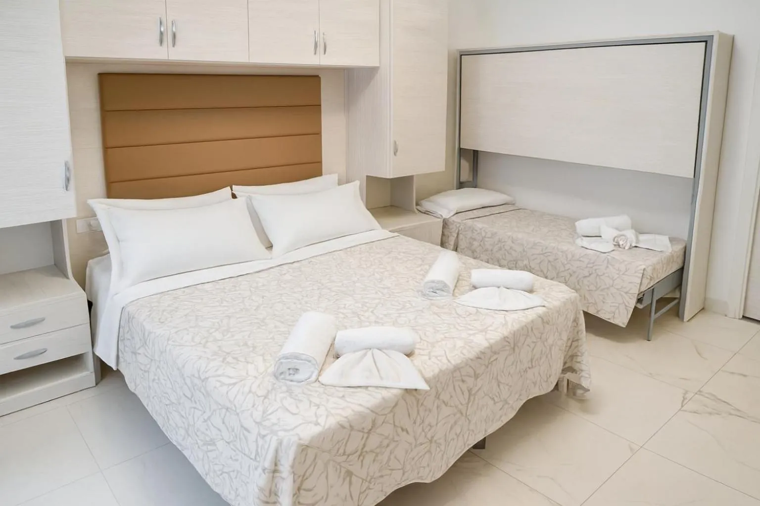 Bed in Hotel Angela