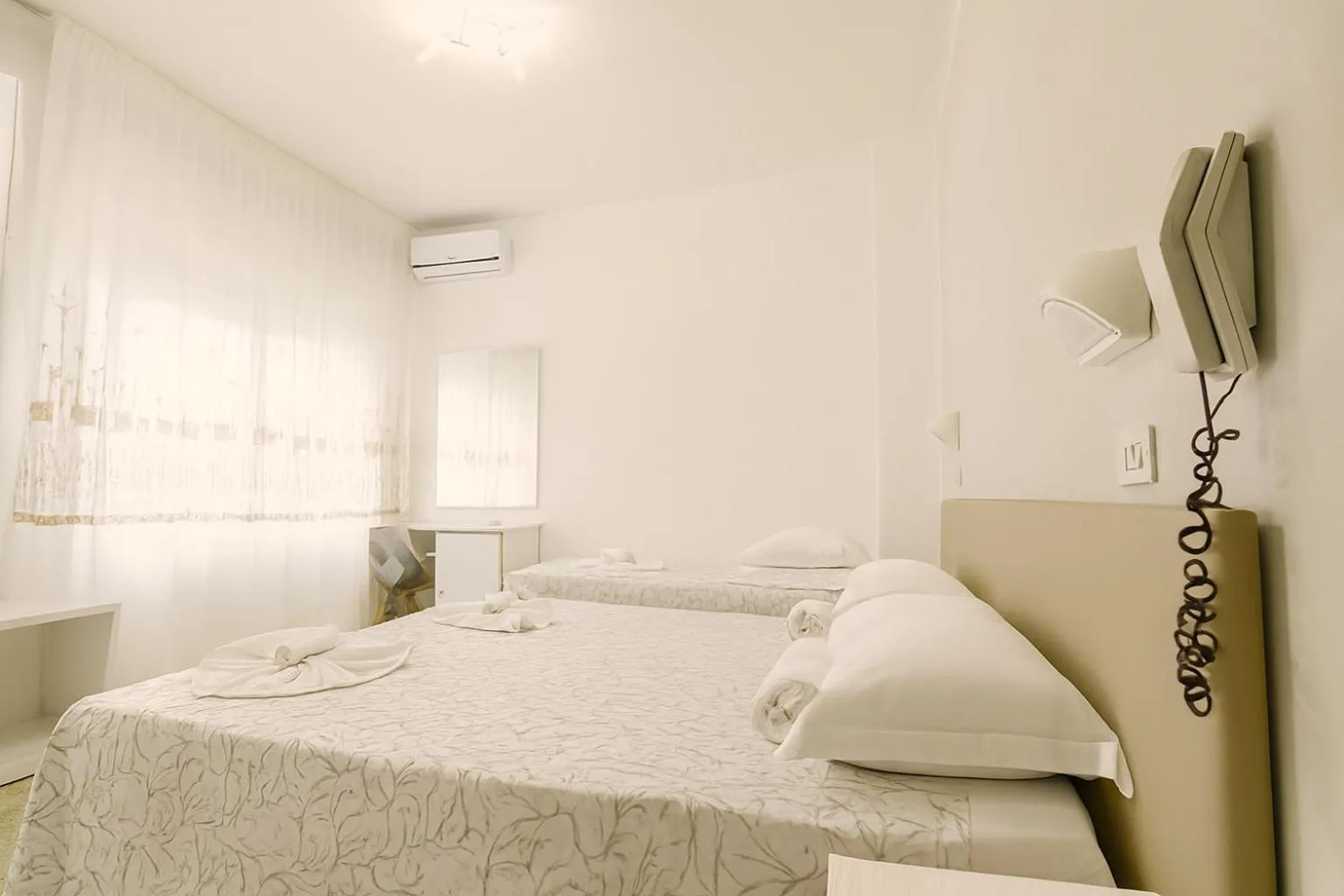 Bed in Hotel Angela
