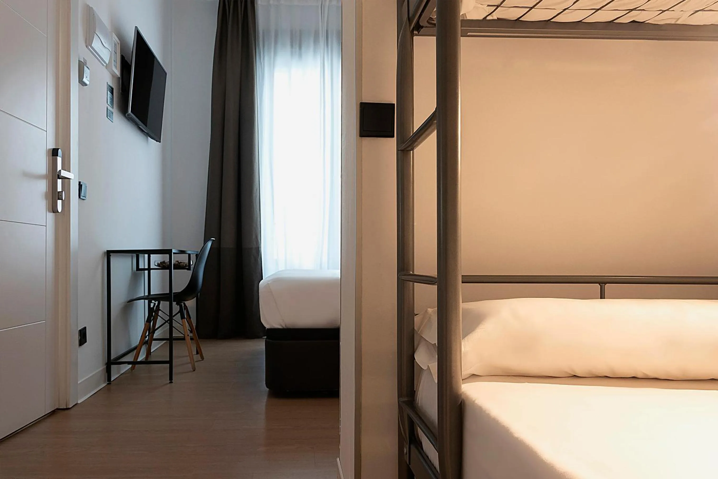 Bed in Woohoo Rooms Chueca