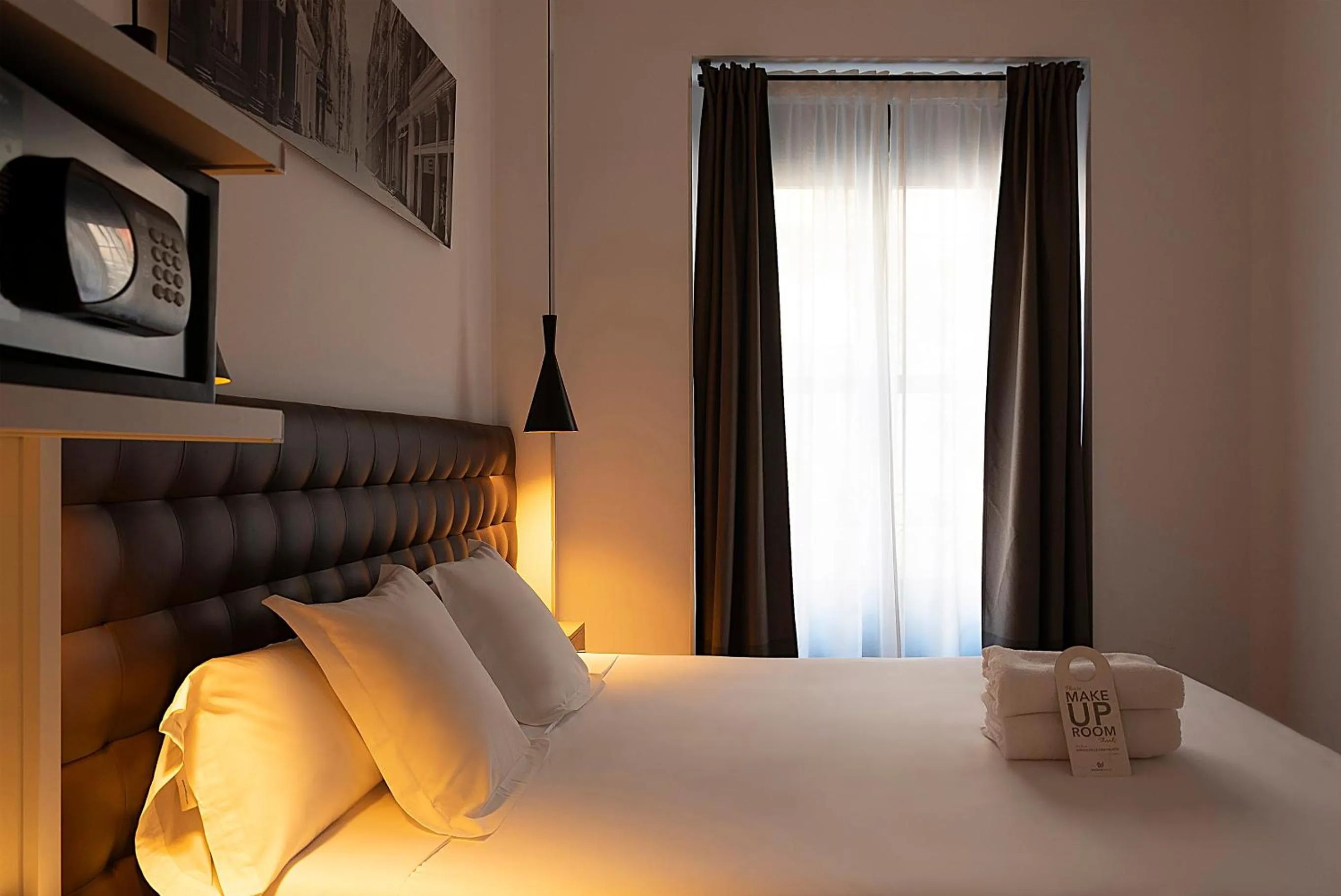 Bed in Woohoo Rooms Chueca