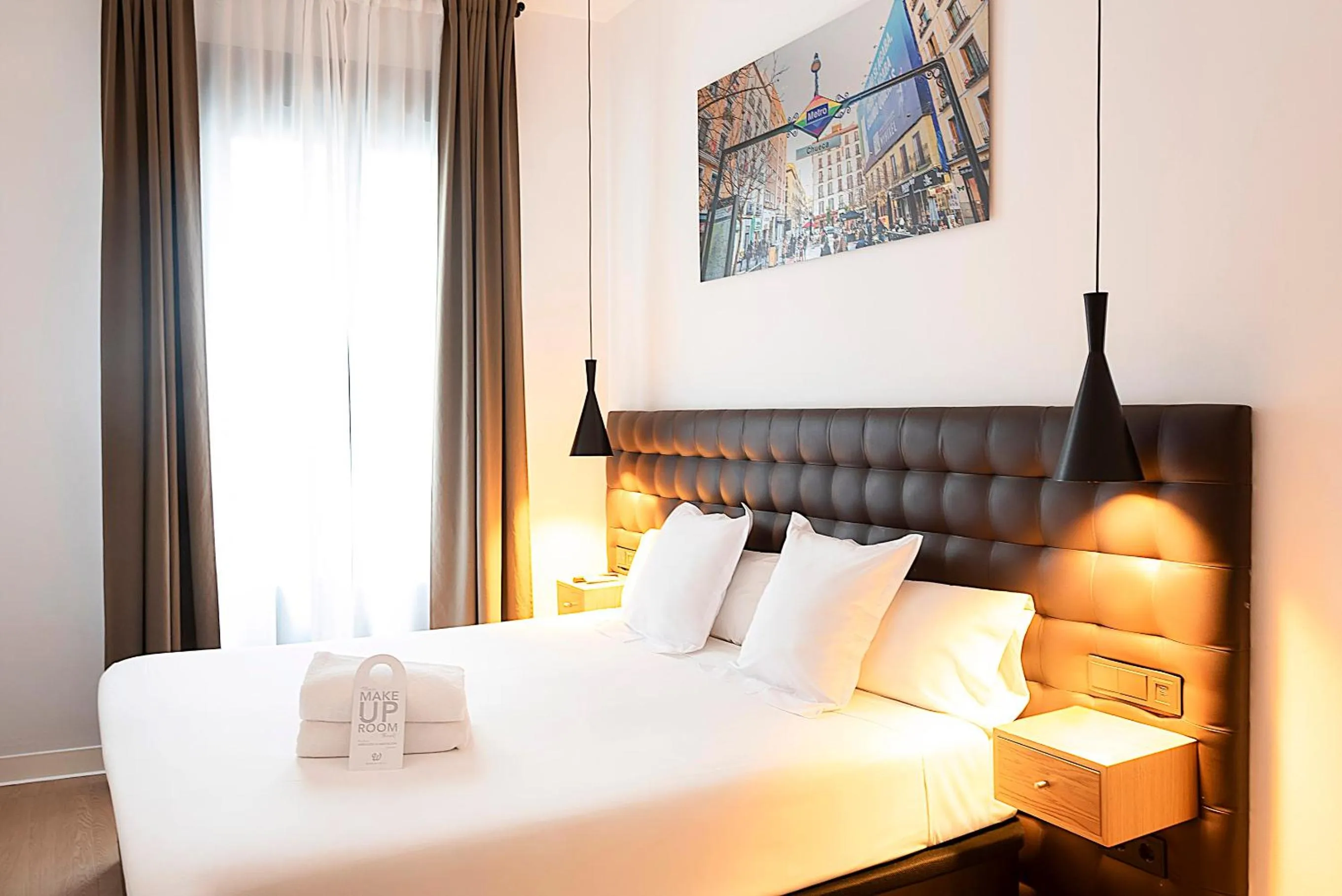 Bed in Woohoo Rooms Chueca