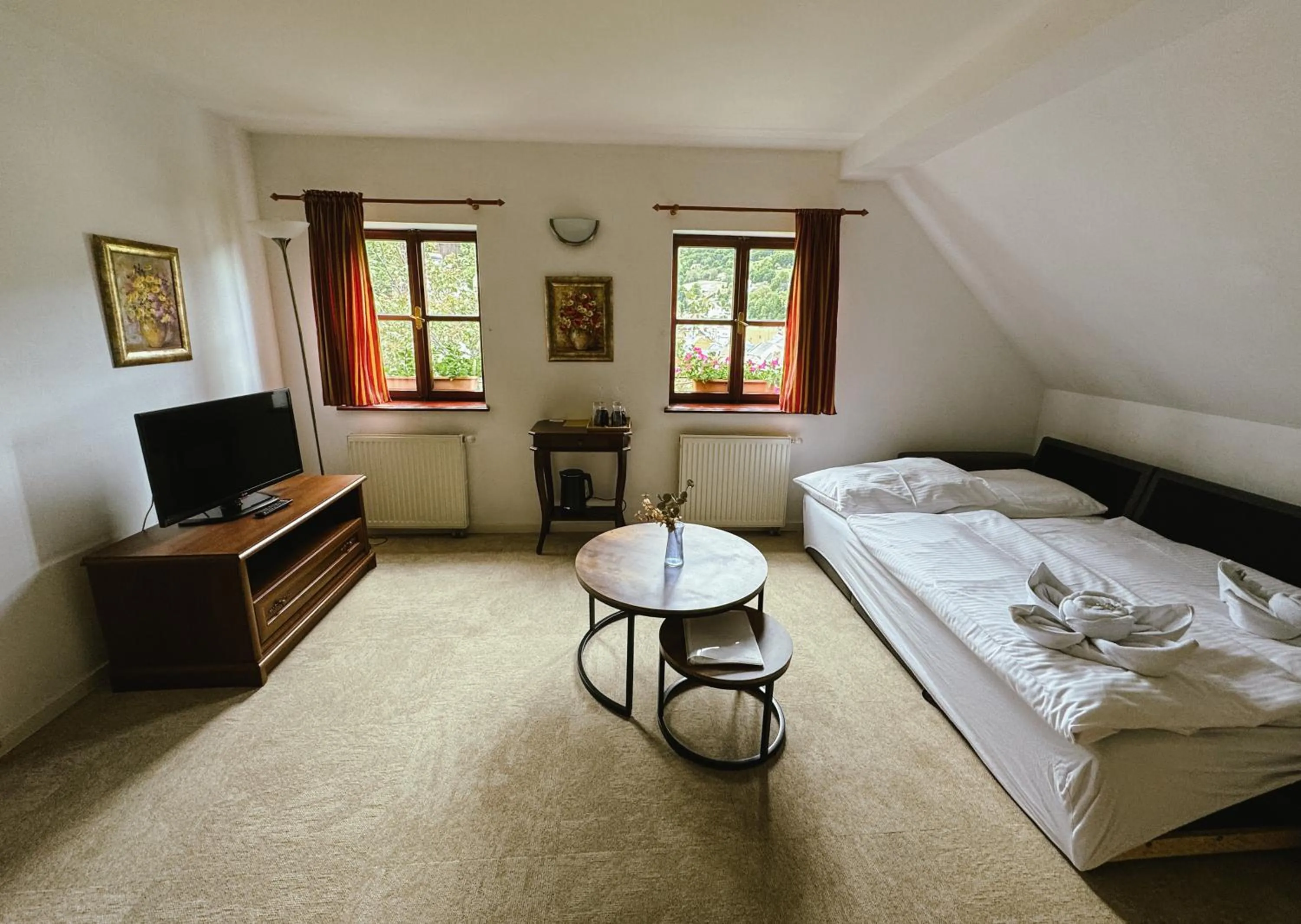 Living room, Bed in Resla Residence I, II, & Wellness