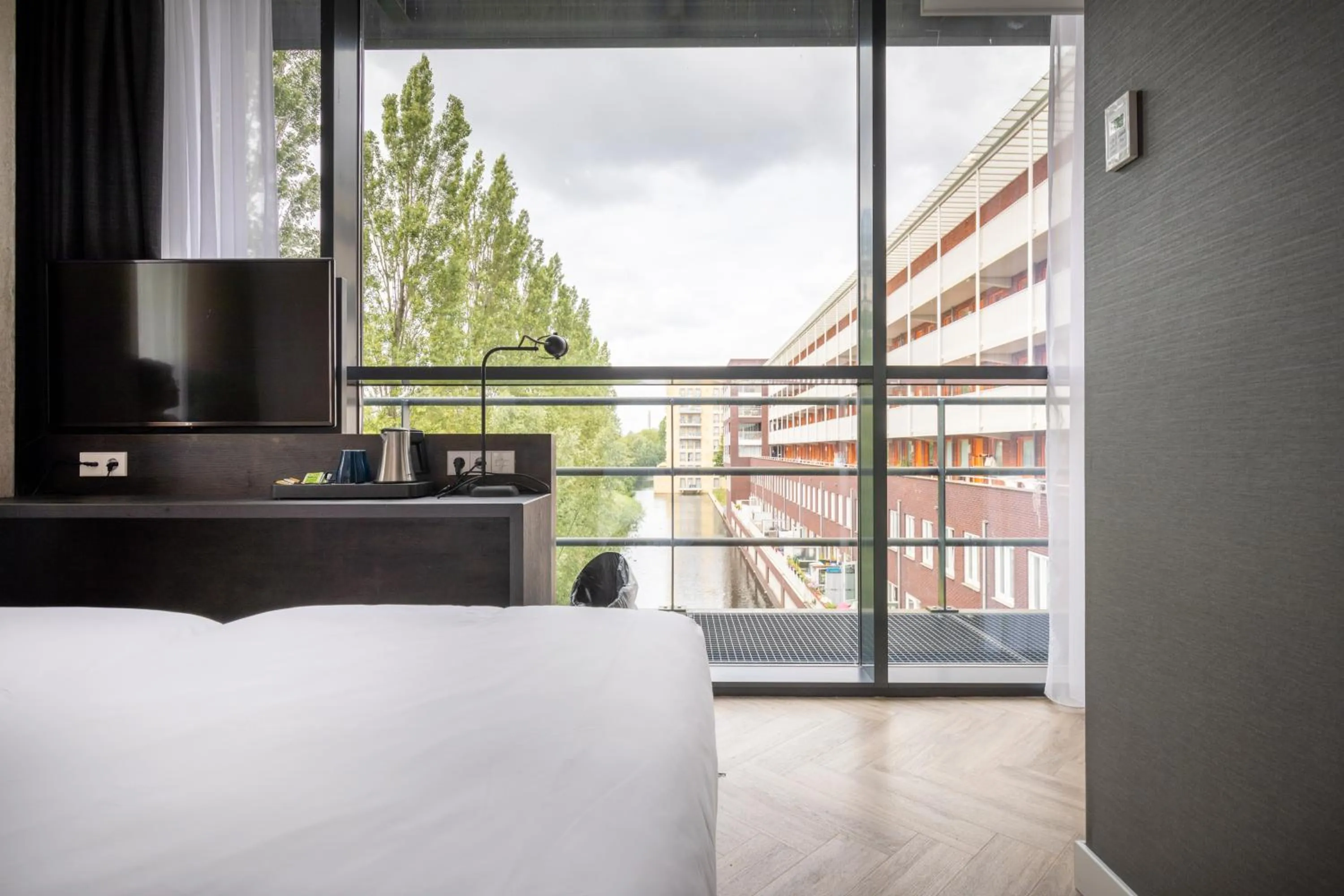 View (from property/room), Bed in Hotel New Kit