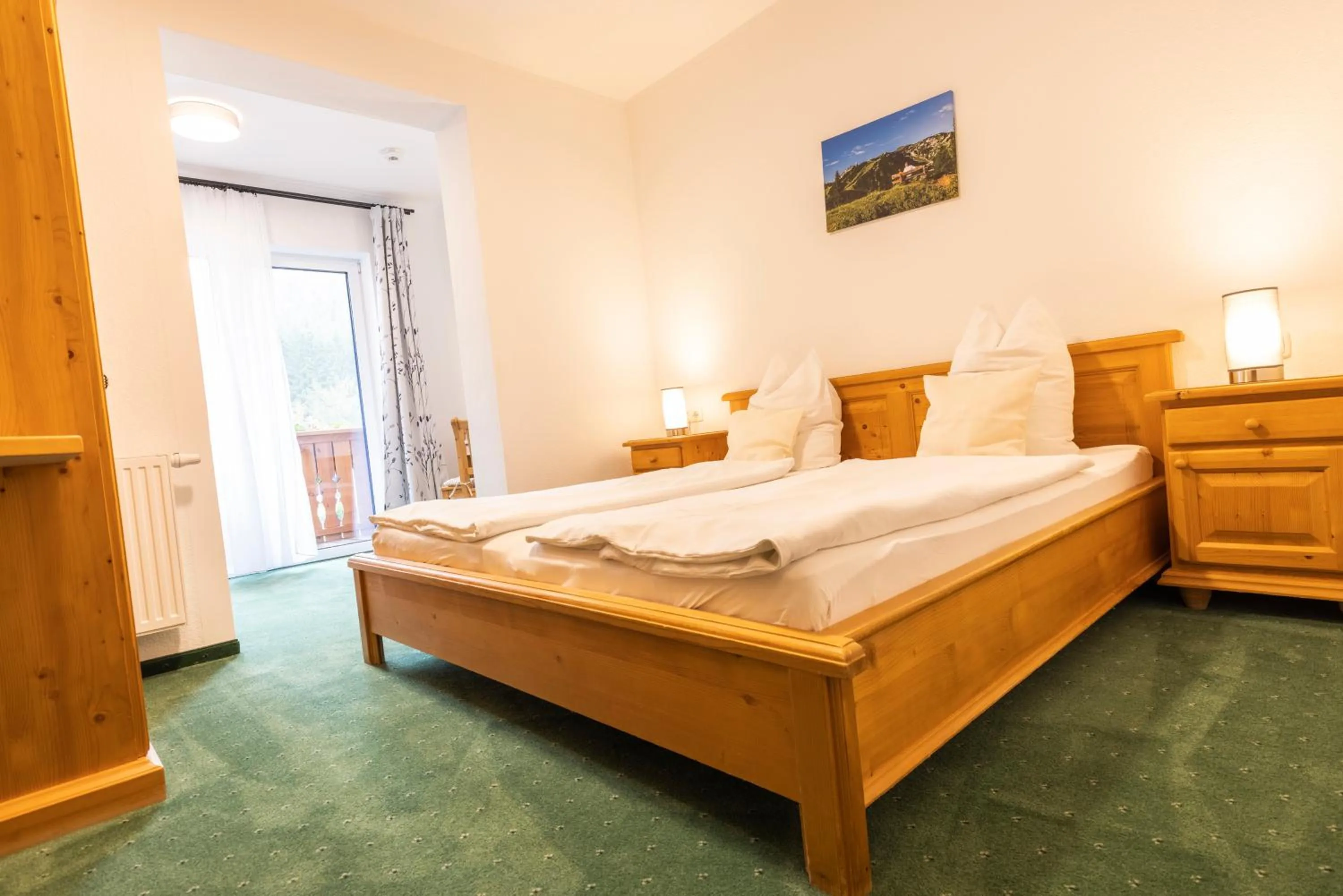 Bed in Alpenhotel Ensmann