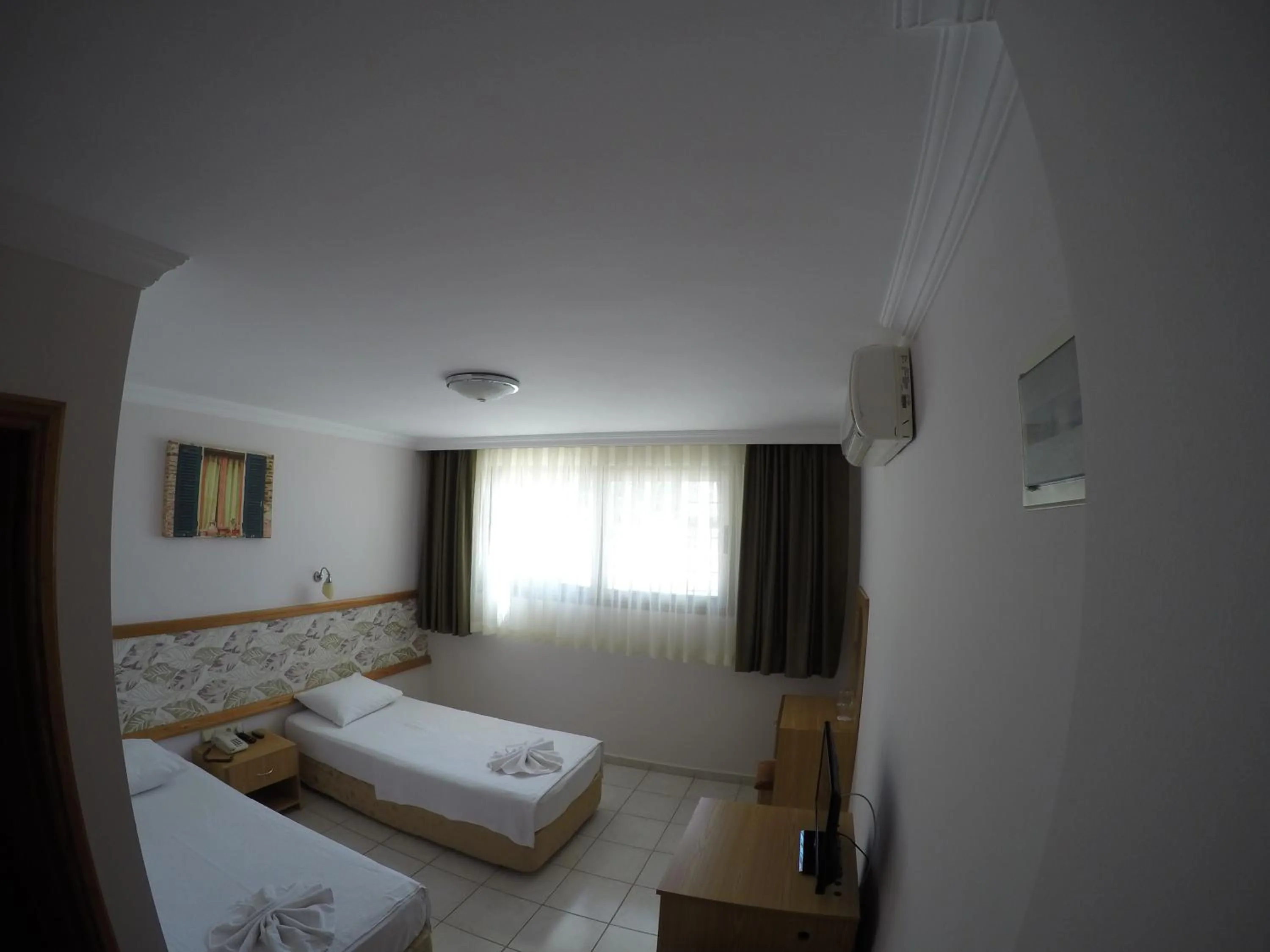 Photo of the whole room, Bed in Gun-Ay Hotel