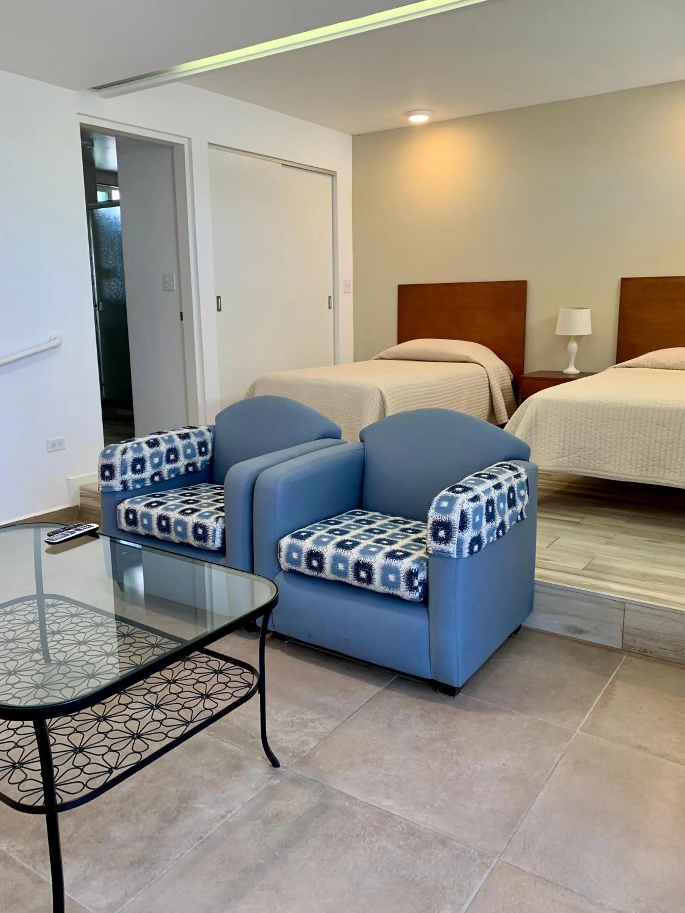 Photo of the whole room, Bed in Dali Suites -Accommodations in Playas de Tijuana