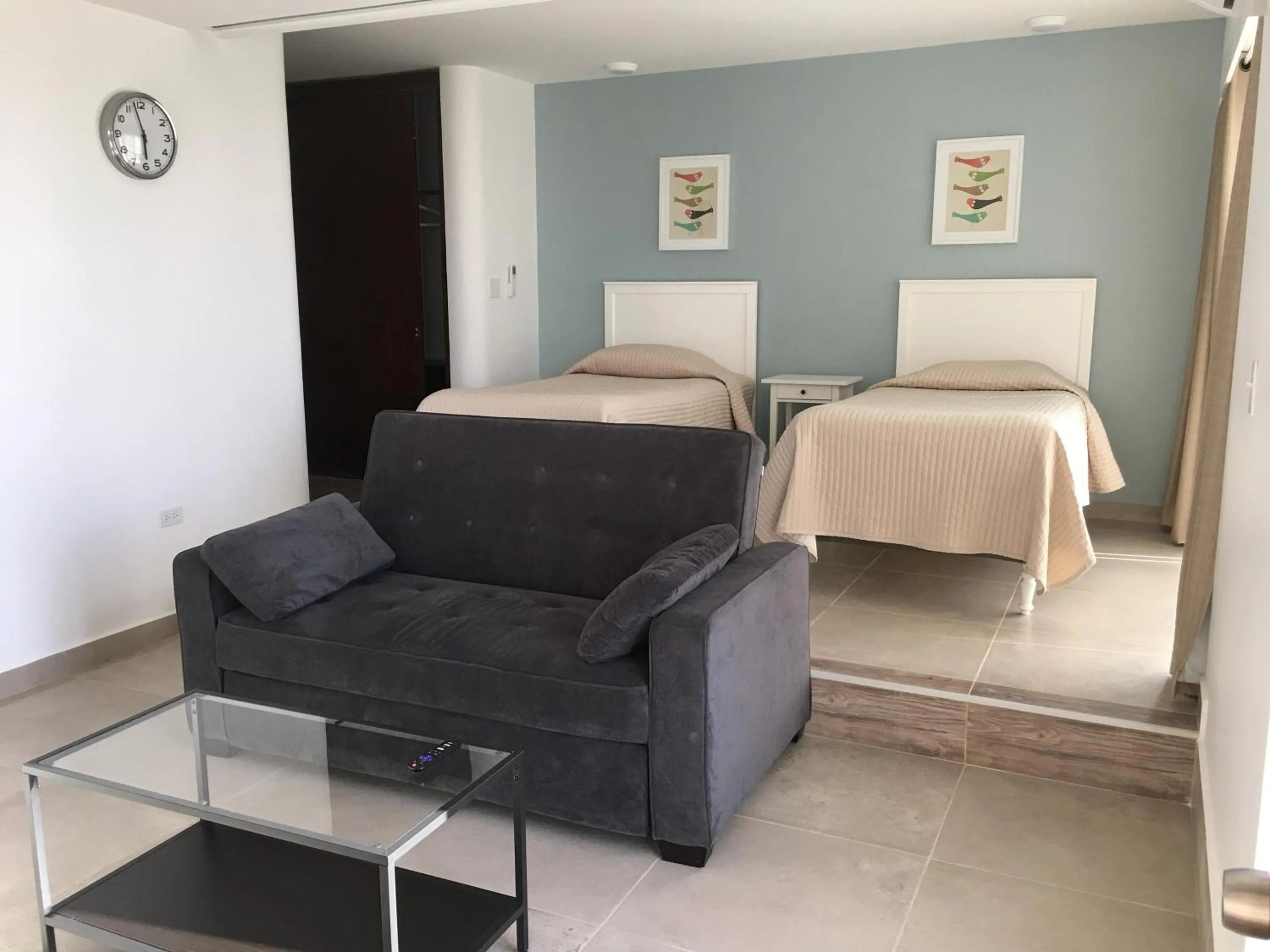 Photo of the whole room, Bed in Dali Suites -Accommodations in Playas de Tijuana