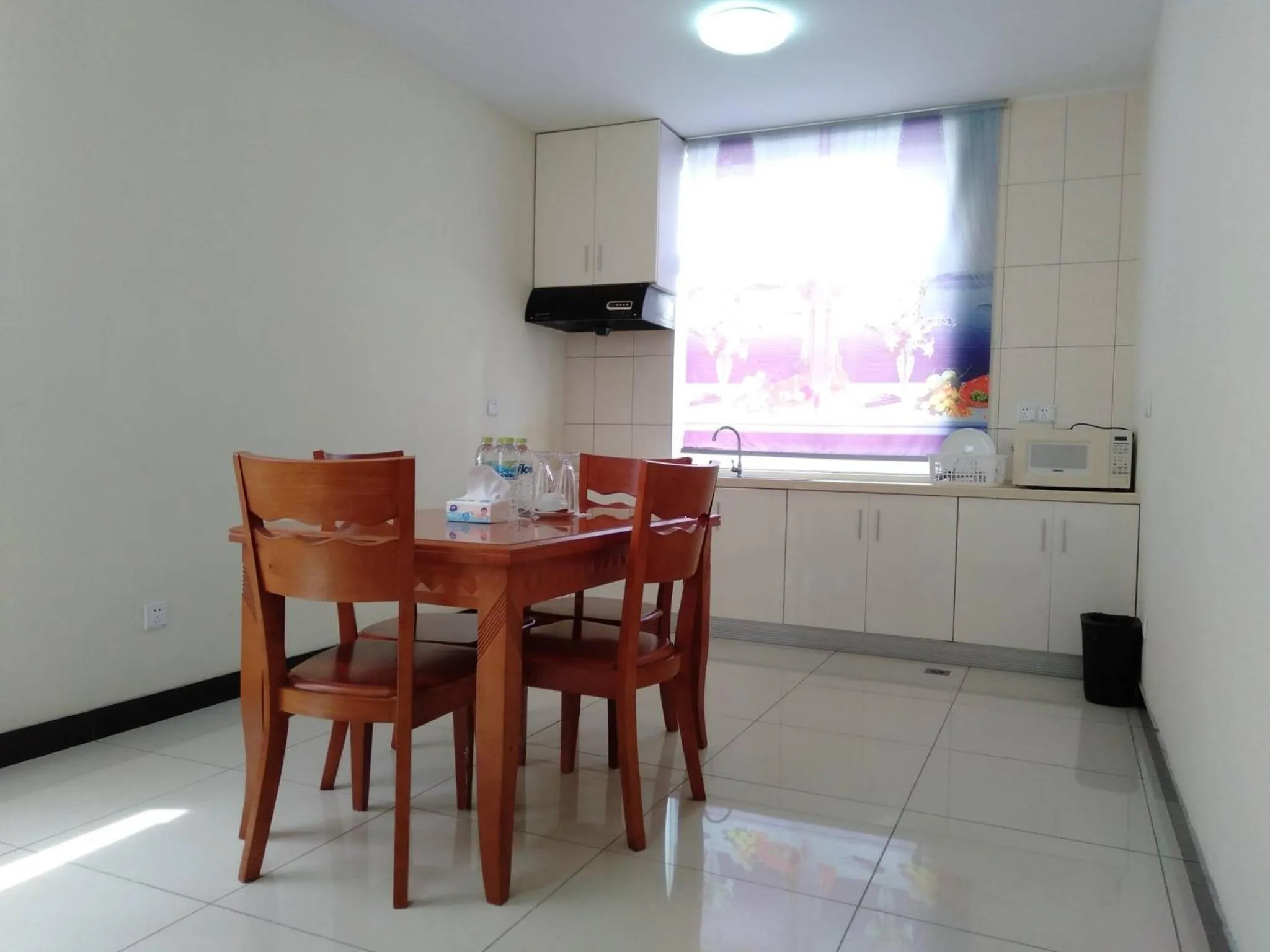 Kitchen or kitchenette in Beach Garden Hotel