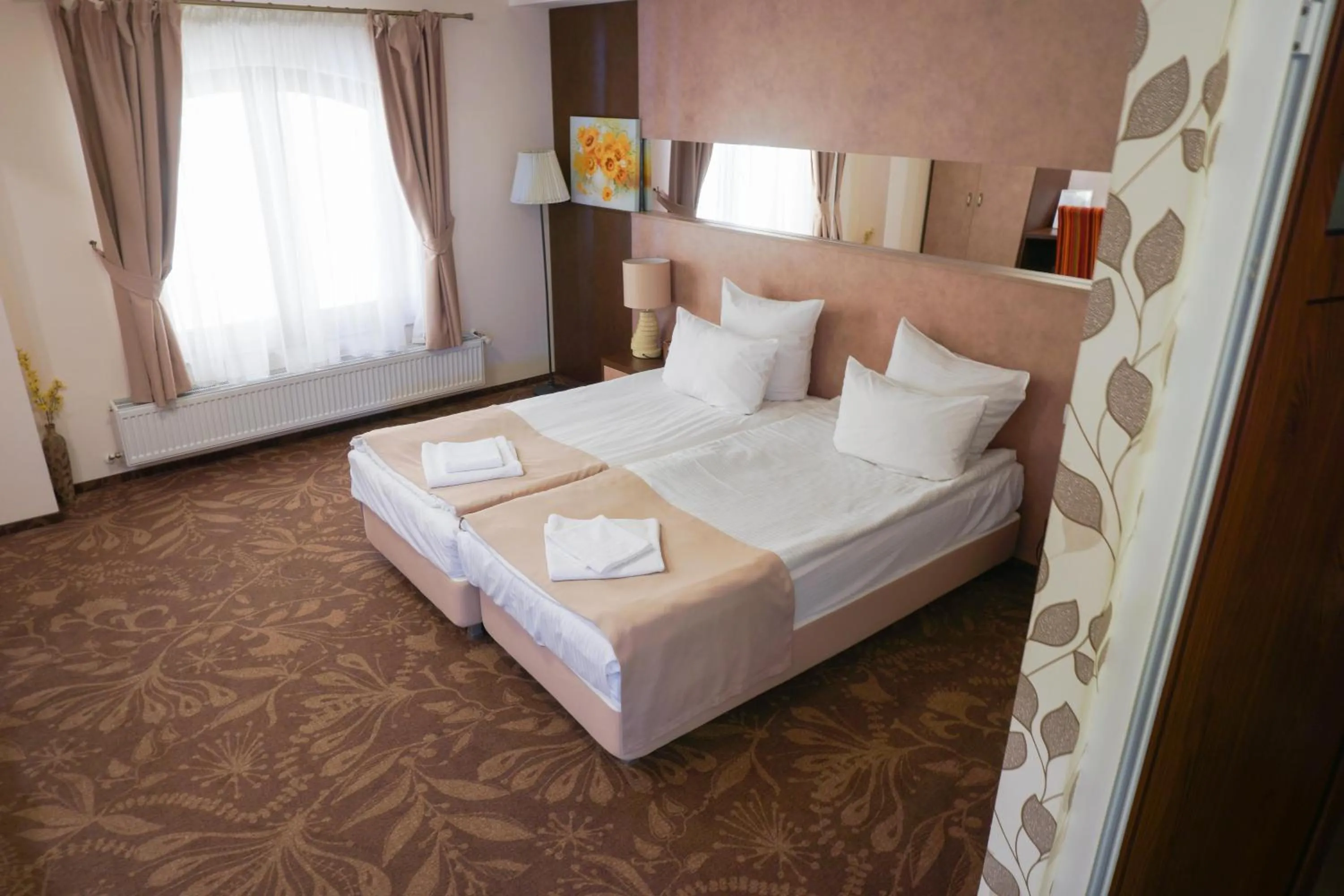 Bed in Pension La Fontana
