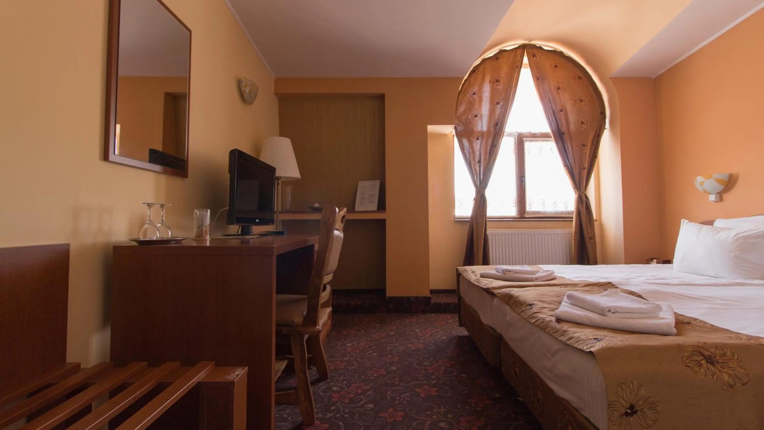 Bed in Pension La Fontana