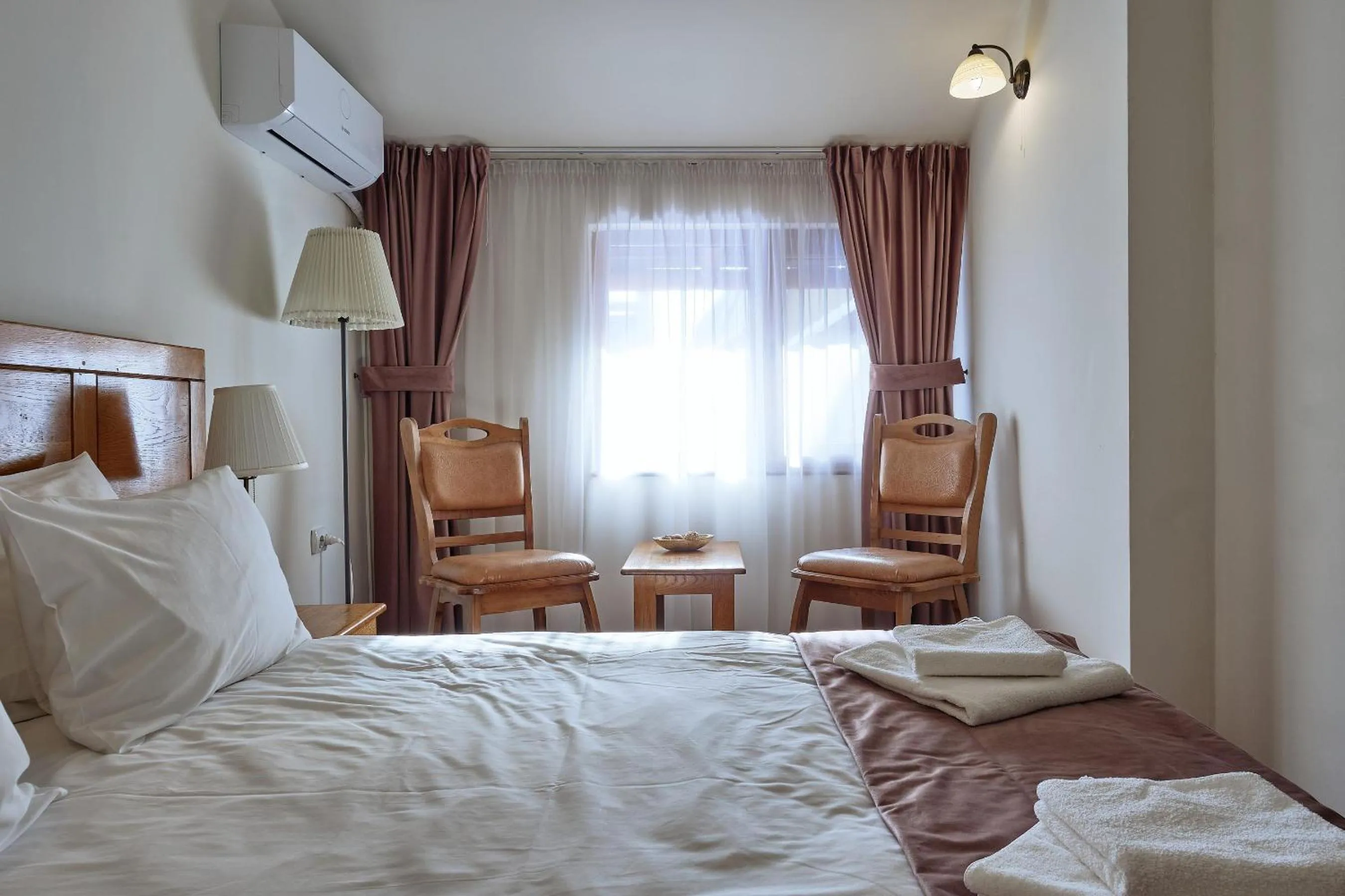 Bed in Pension La Fontana